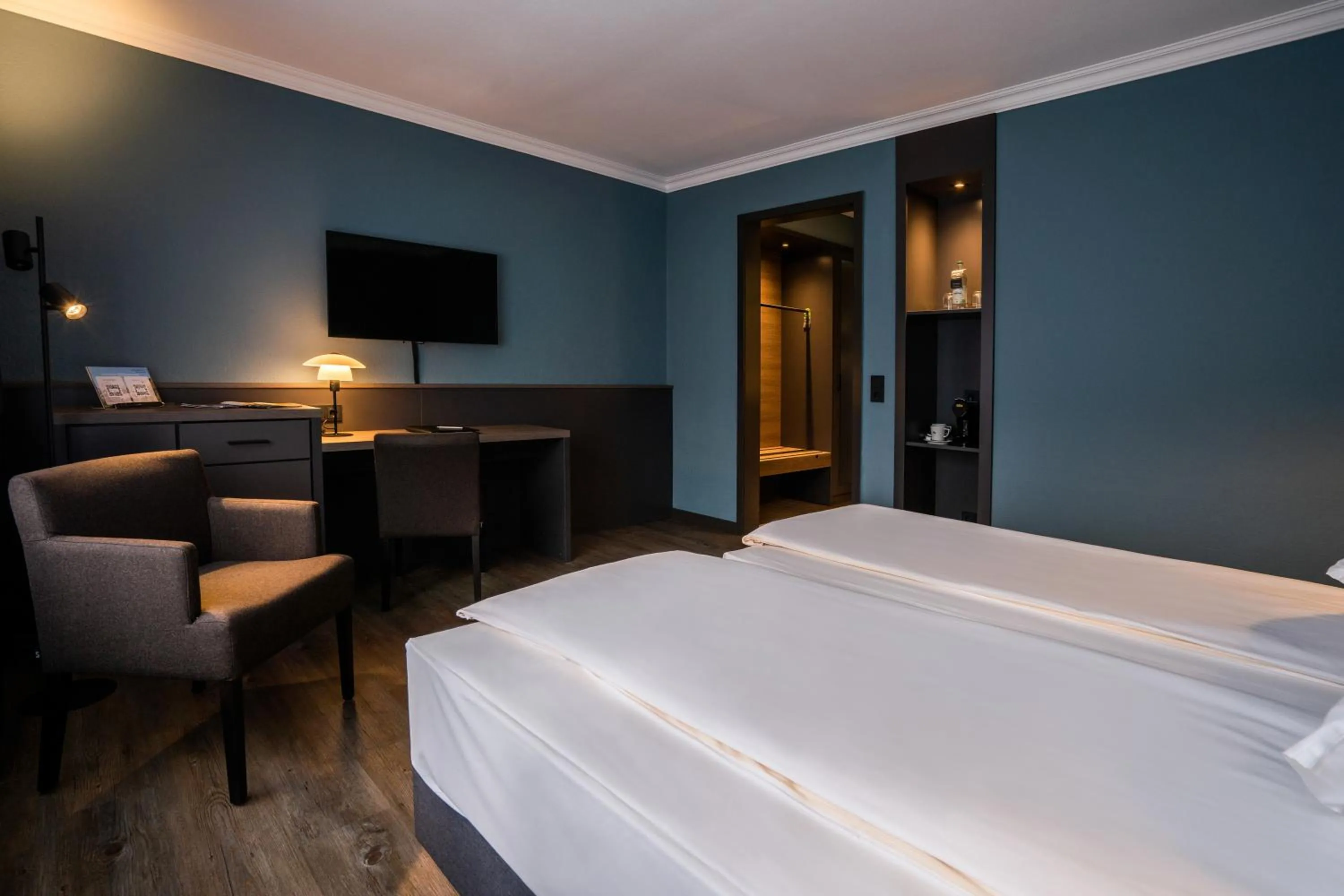 Photo of the whole room, Bed in ATLANTIC Hotel Landgut Horn