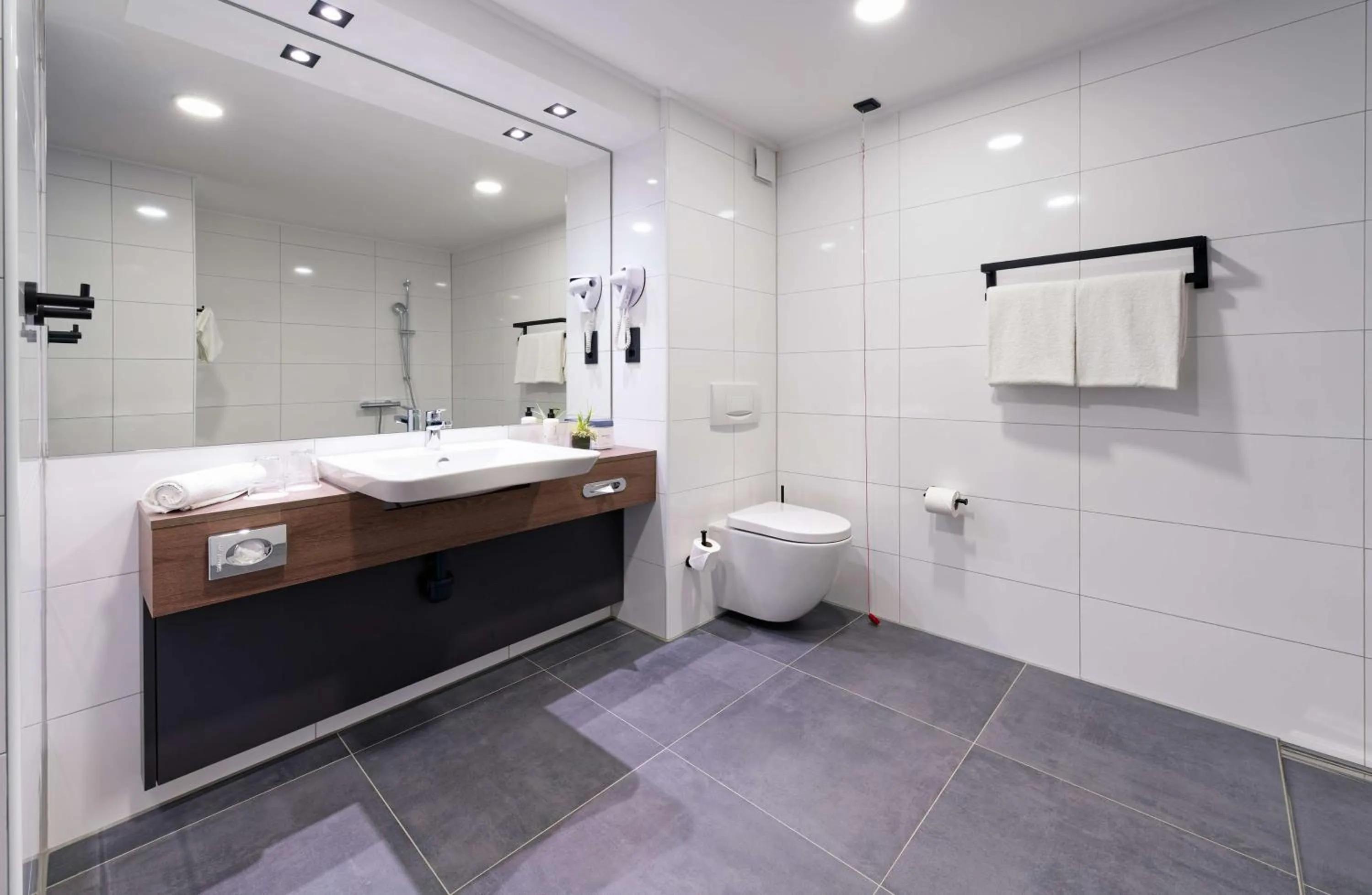 Bathroom in ATLANTIC Hotel Landgut Horn