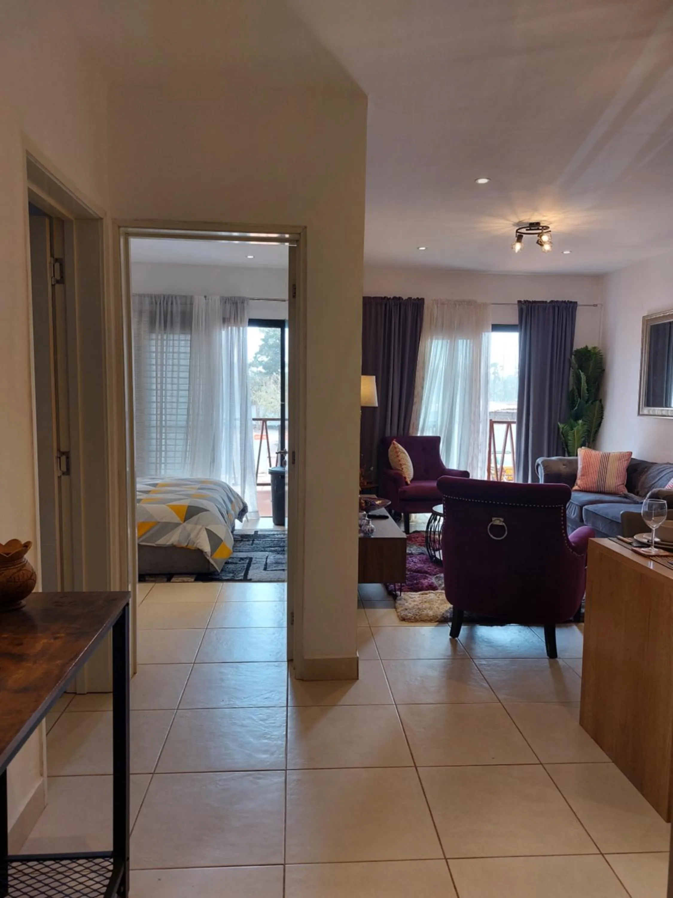 Living room, Bed in Forest View Apartments