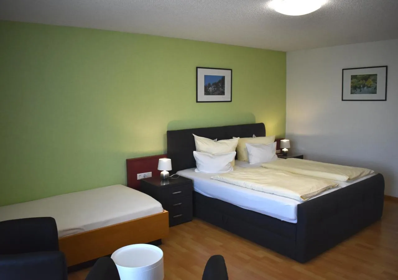 Photo of the whole room, Bed in TIPTOP Hotel am Hochrhein