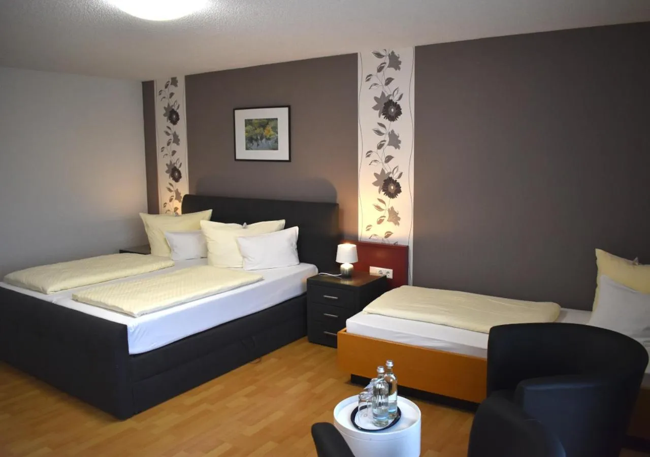 Photo of the whole room, Bed in TIPTOP Hotel am Hochrhein