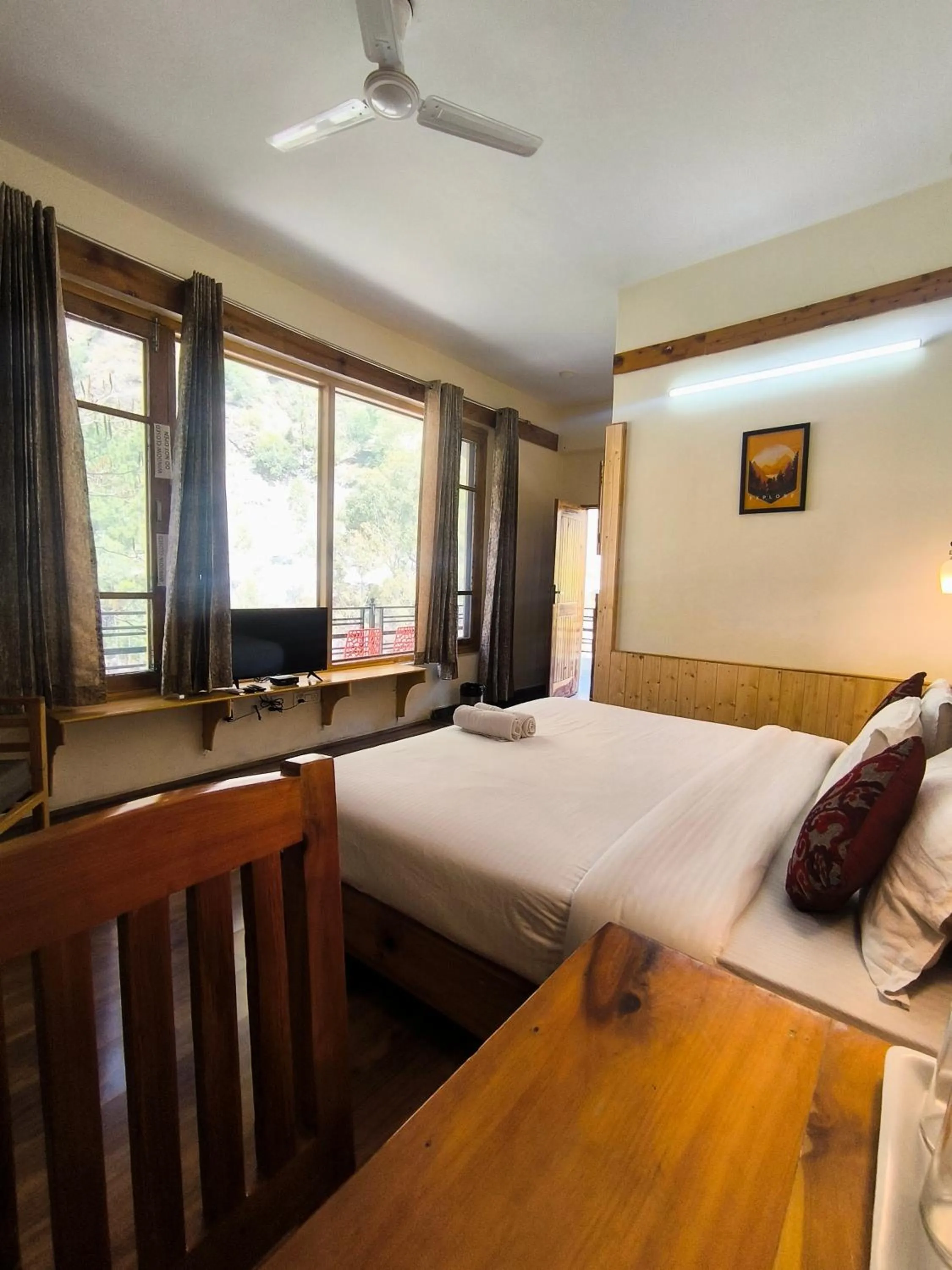 Bed in Tirthan Grand Riverside