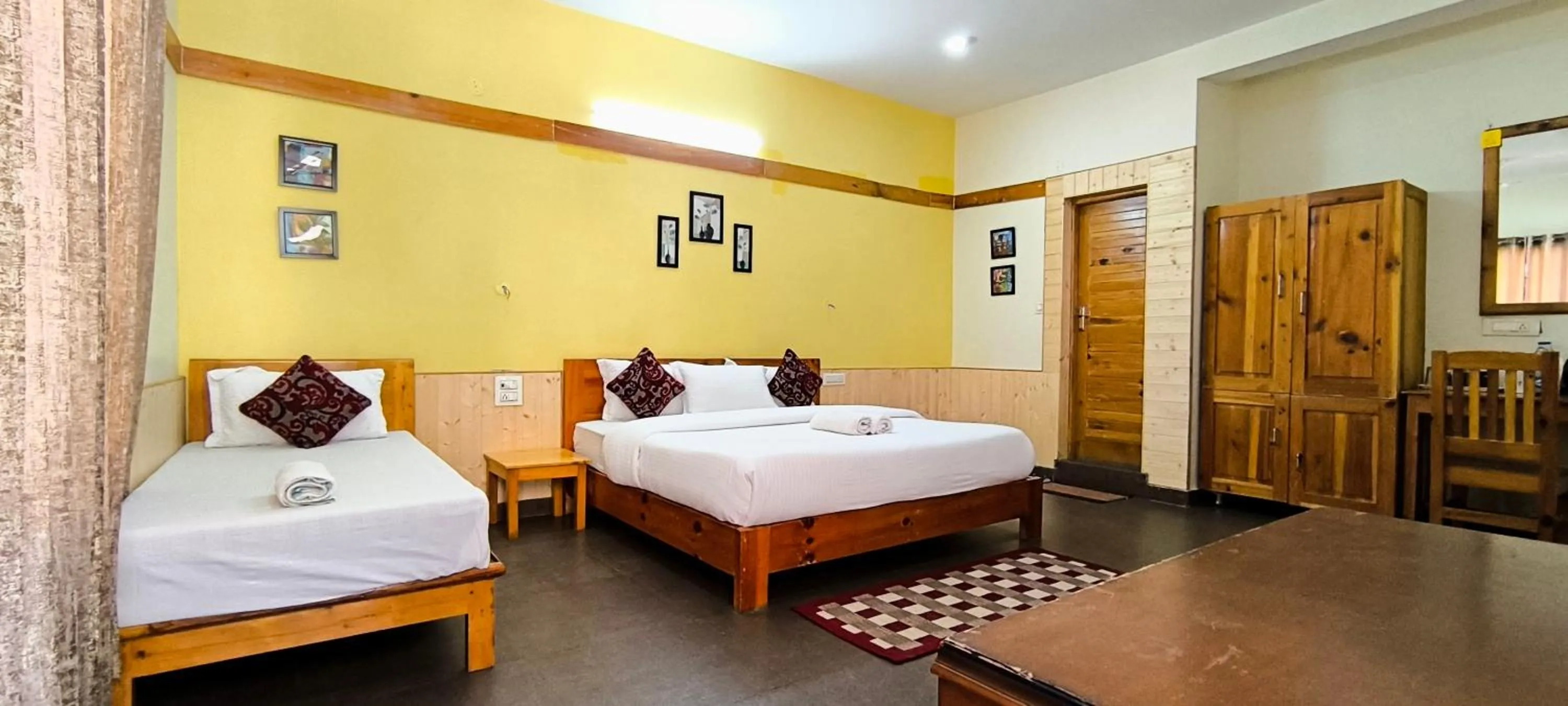 Bed in Tirthan Grand Riverside