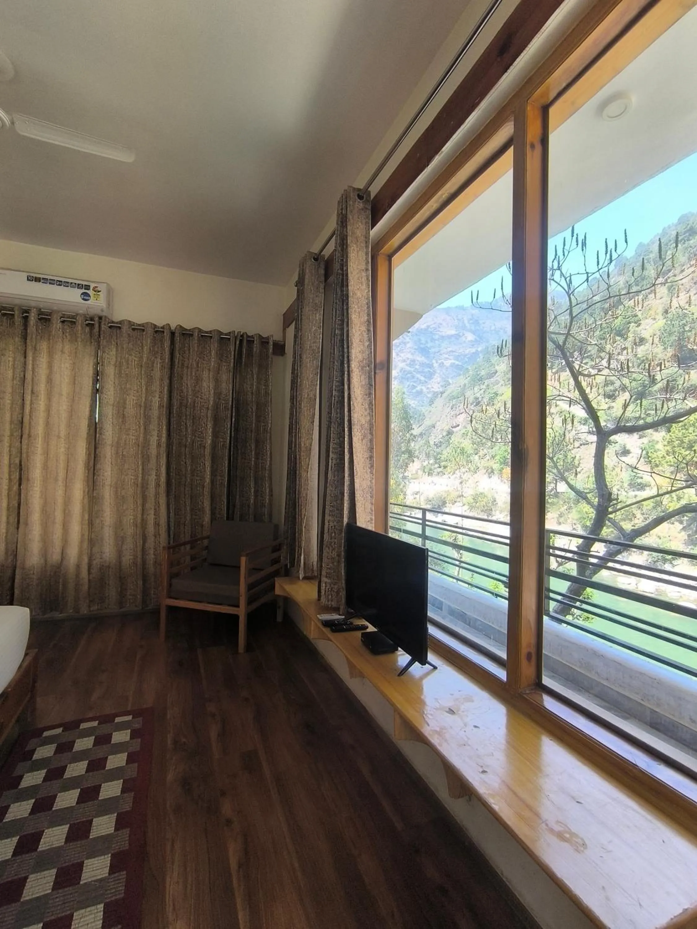 Tirthan Grand Riverside