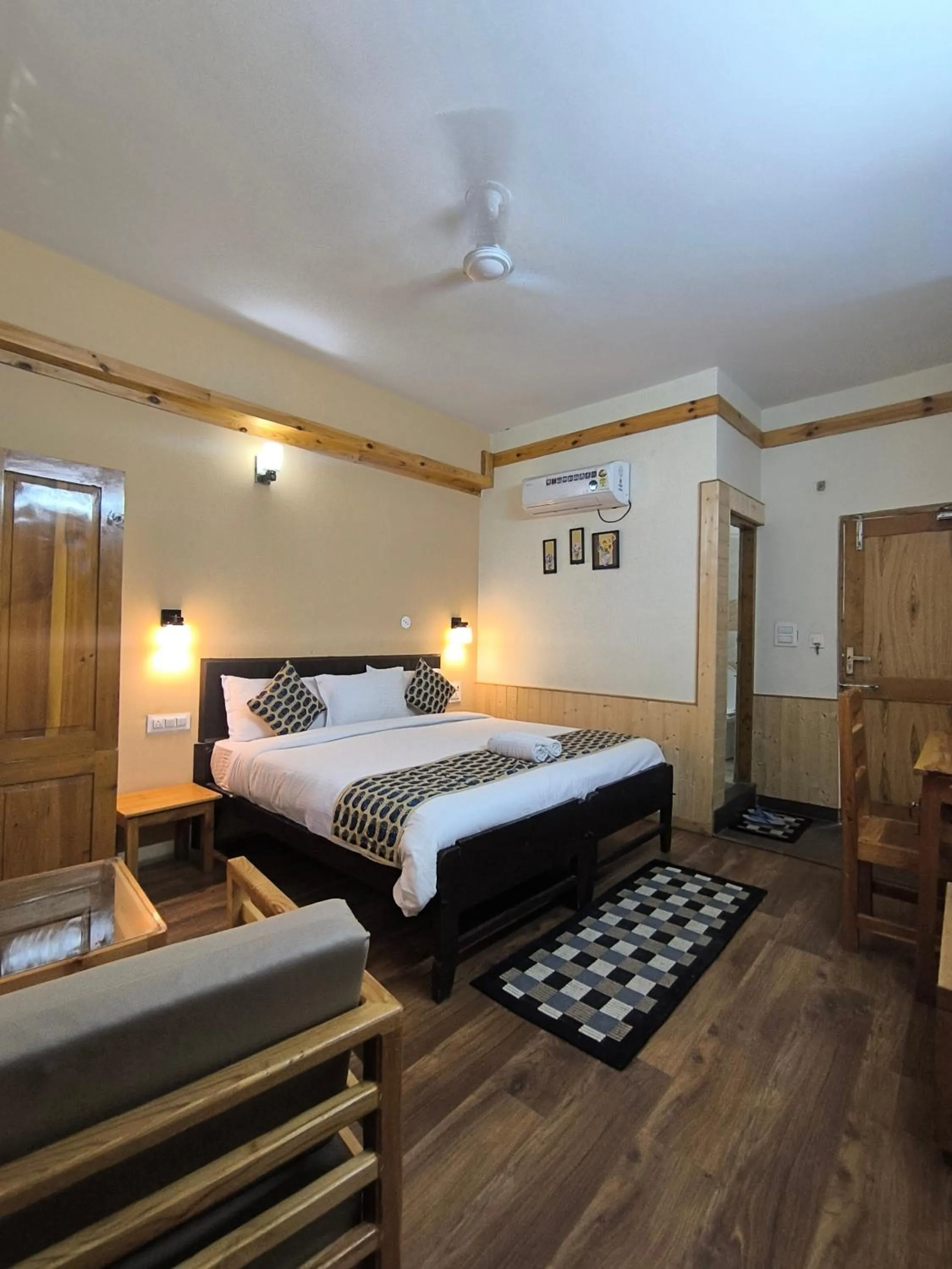 Bed in Tirthan Grand Riverside