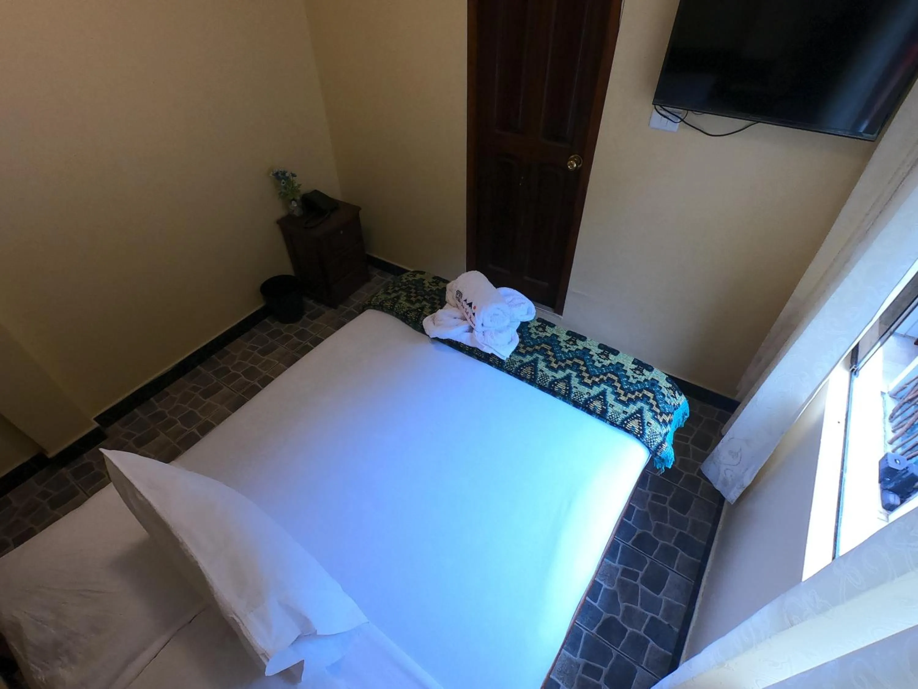 Communal lounge/ TV room in Don Feli House