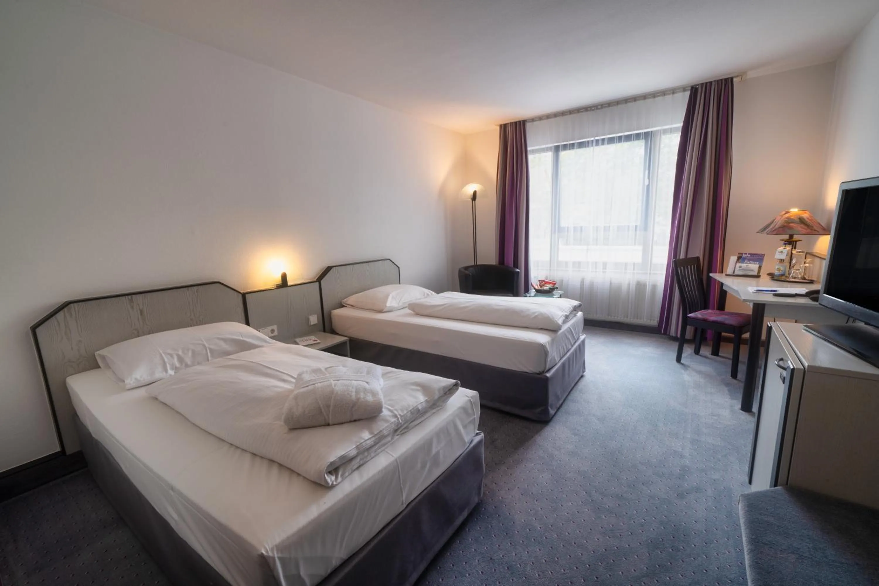 Photo of the whole room, Bed in City Hotel Fortuna Reutlingen