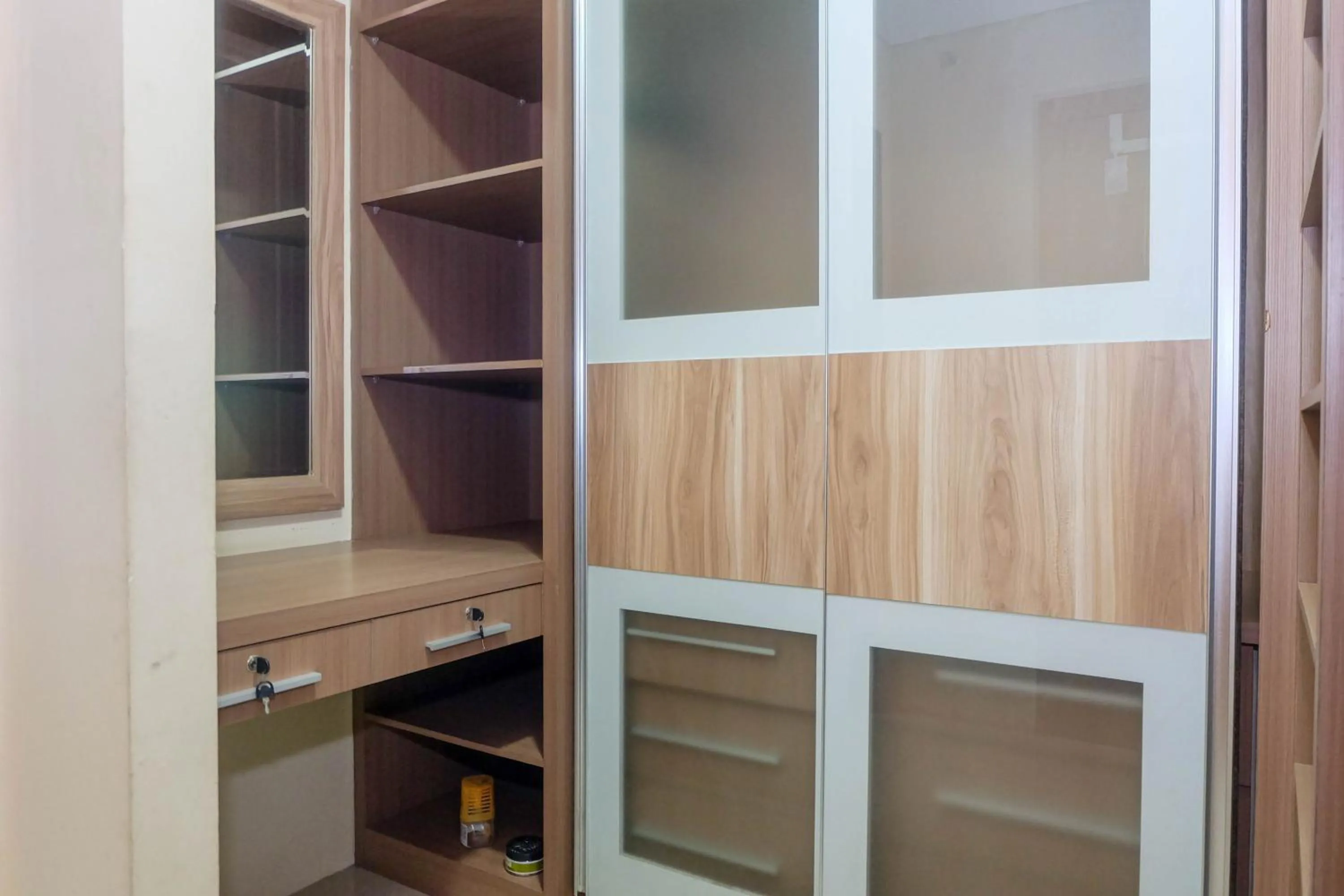 Good Location with Simply Furnished 1BR Apartment Woodland Park Residence By Travelio