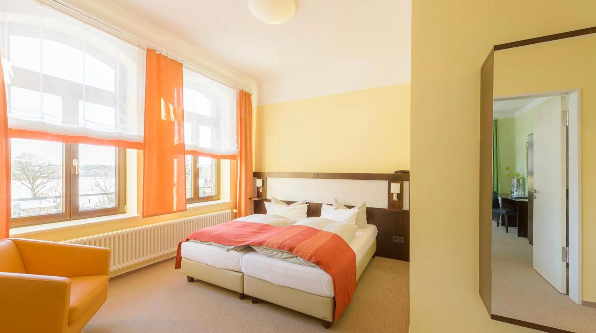 Photo of the whole room, Bed in Hotel Am Tiefwarensee