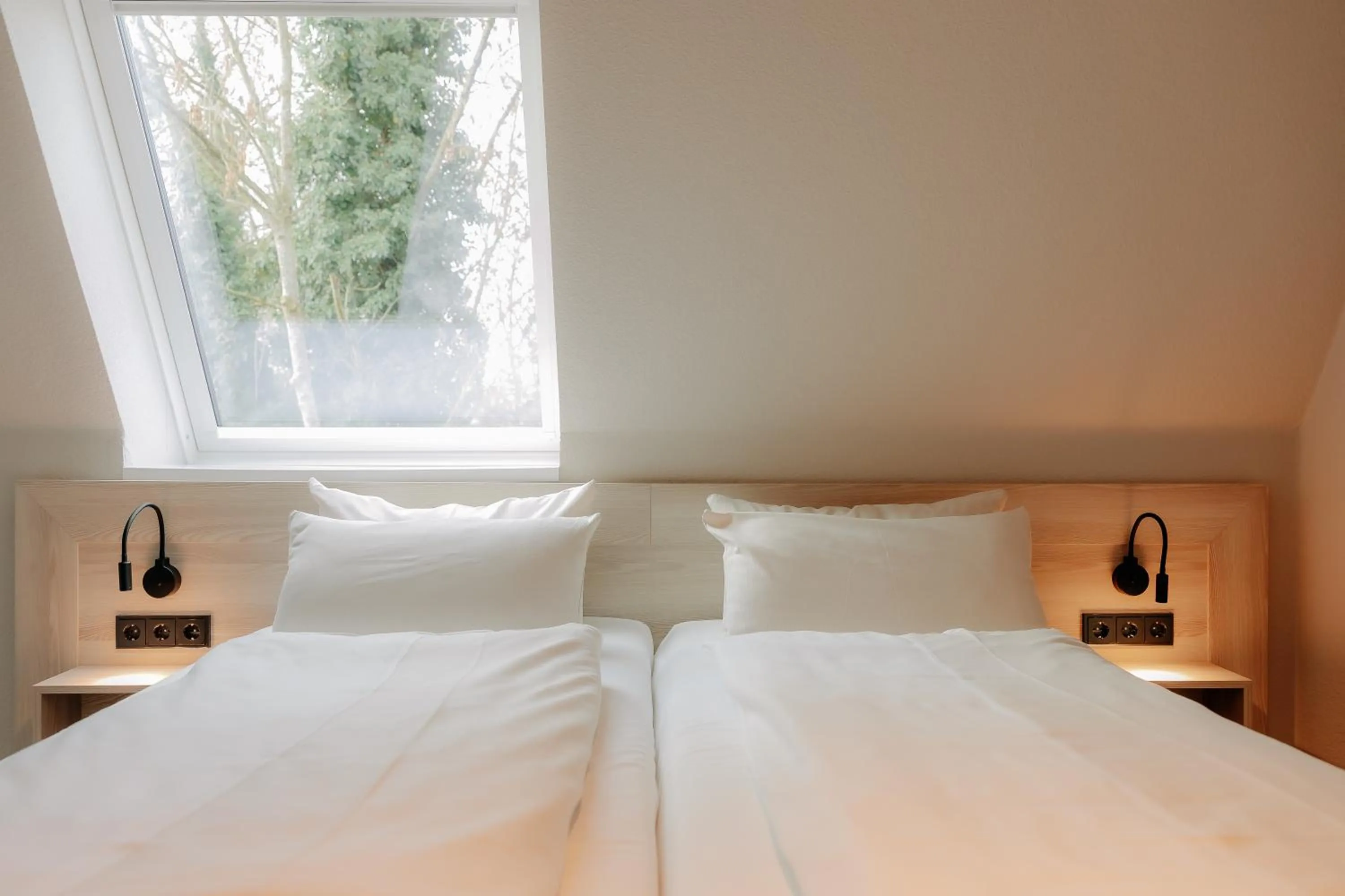 Bed in Parkhotel Papenburg by Hackmann