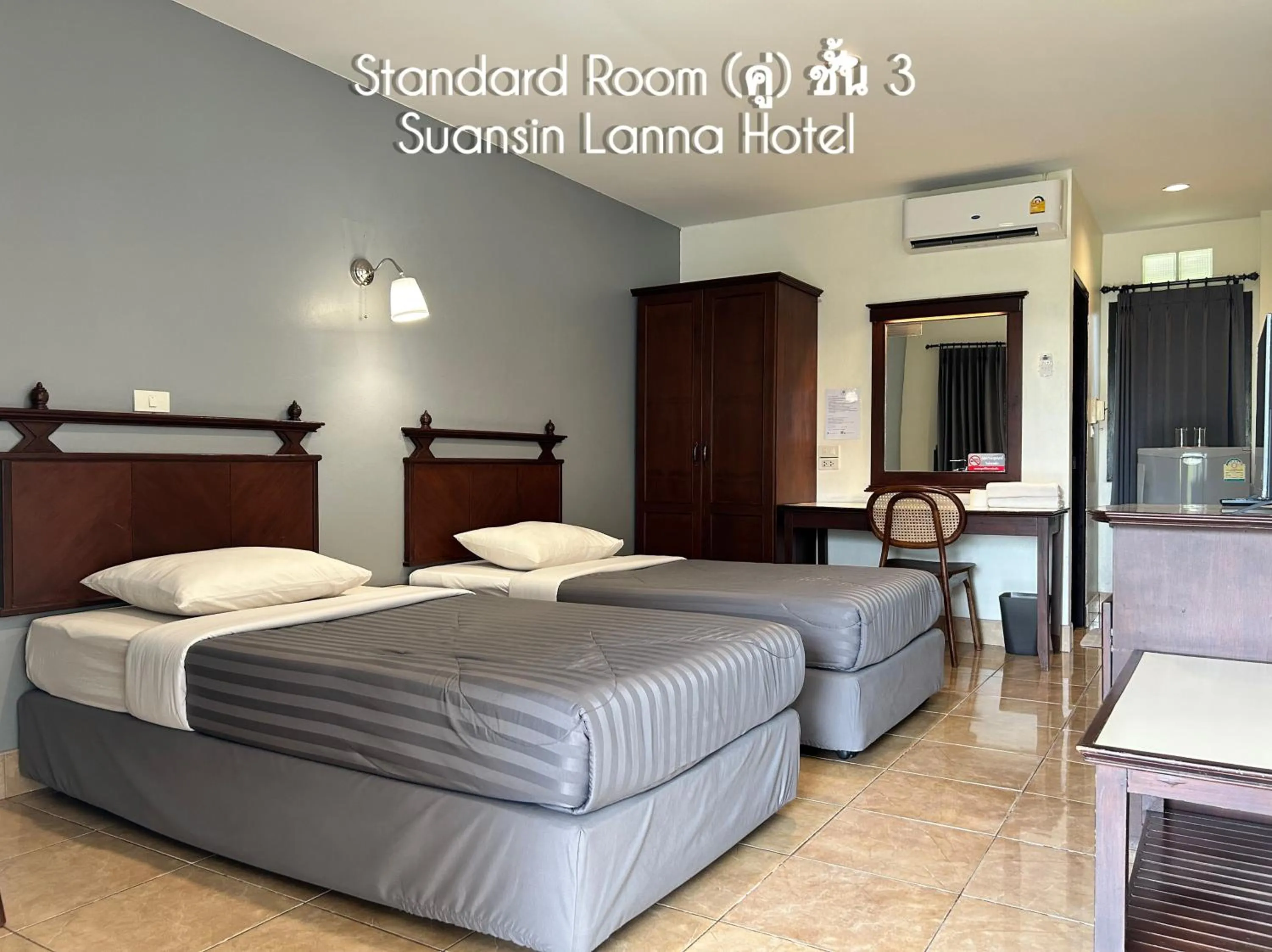Bed in Suansin Lanna Hotel