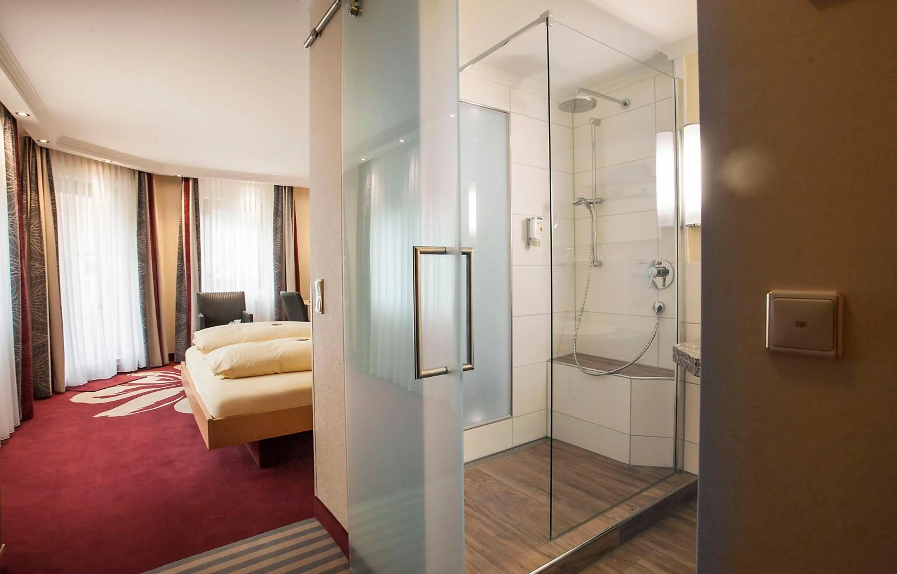 Photo of the whole room, Bed in Forellenhof Rössle Hotel & Restaurant