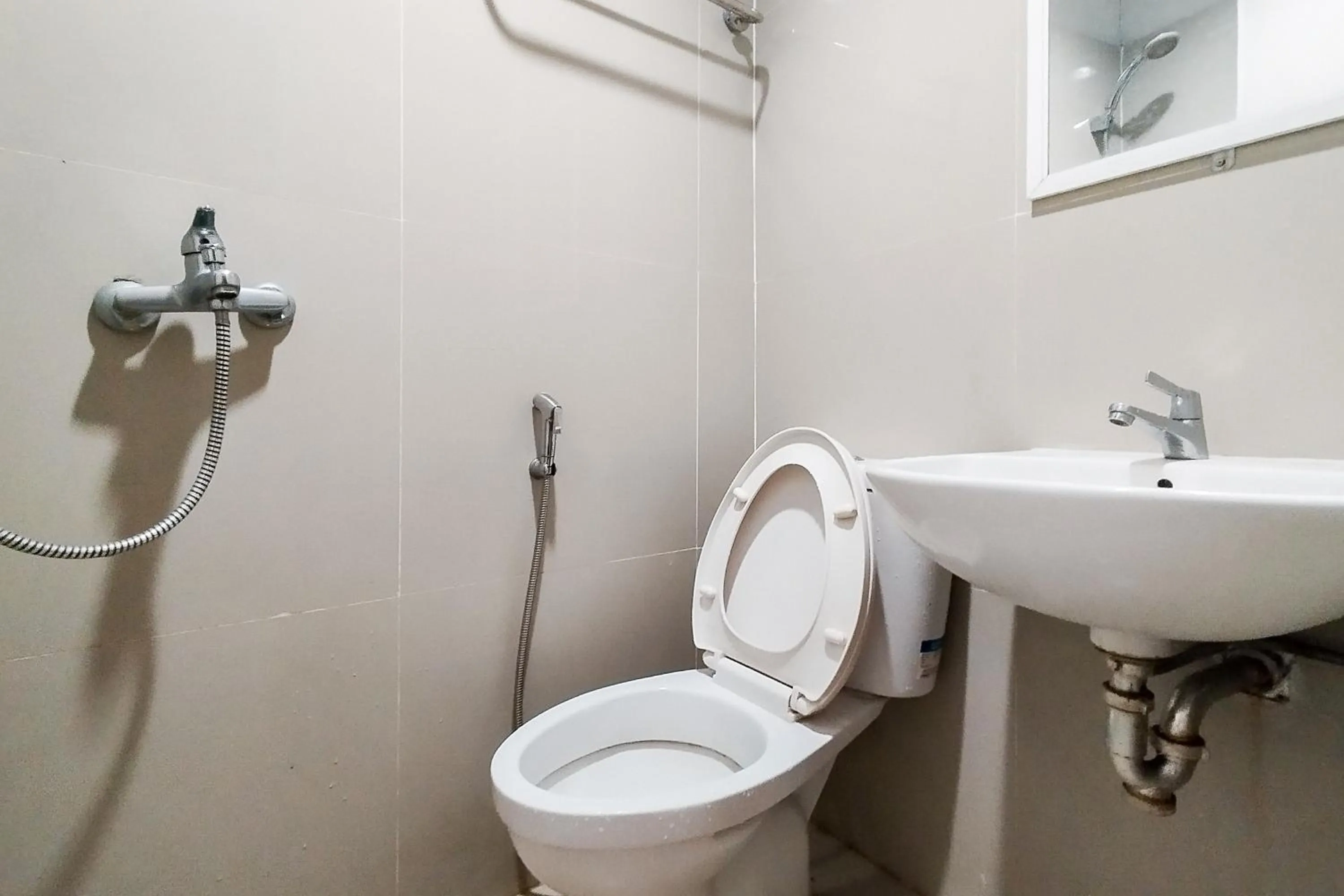 Bathroom in Alfalah Residence Syariah Mitra RedDoorz