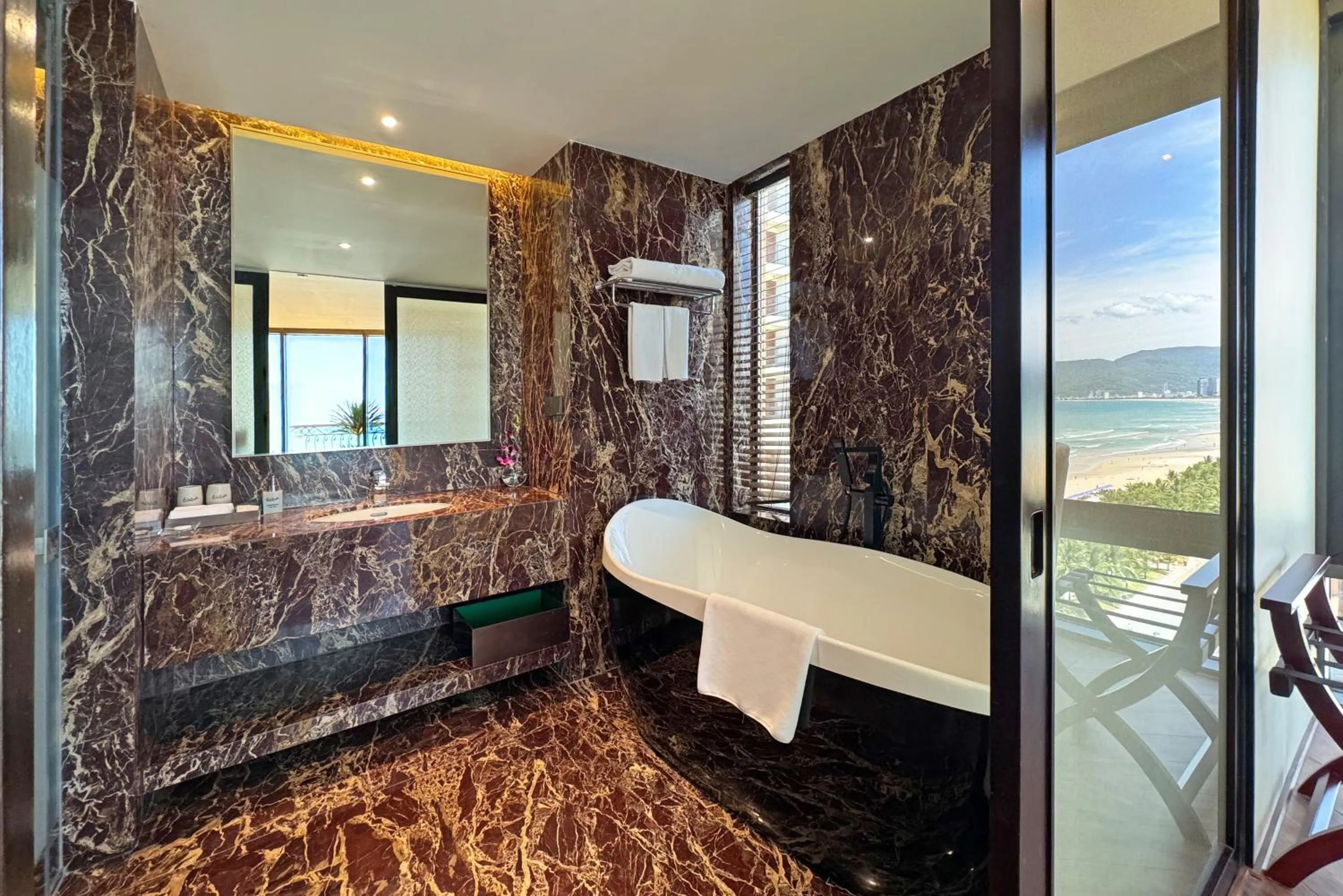 Bathroom, Bed in Holiday Beach Hotel Danang