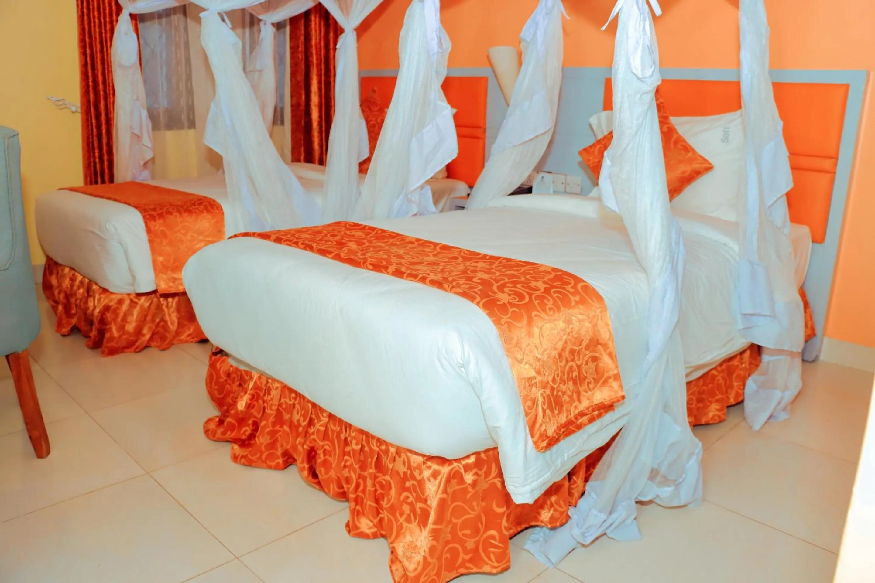 Bed in Best Western Jangwani Sea Breeze Resort