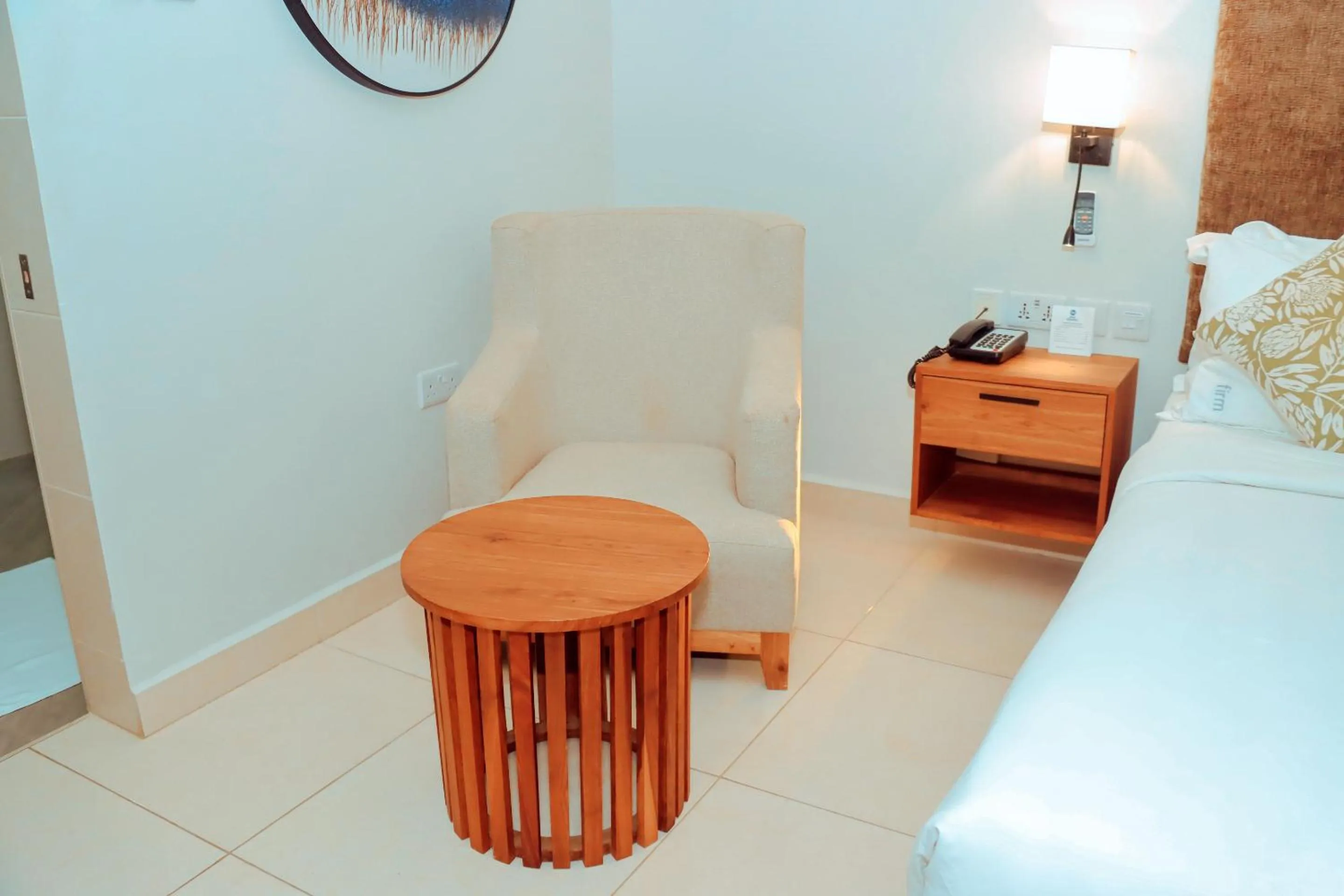 Bed in Best Western Jangwani Sea Breeze Resort