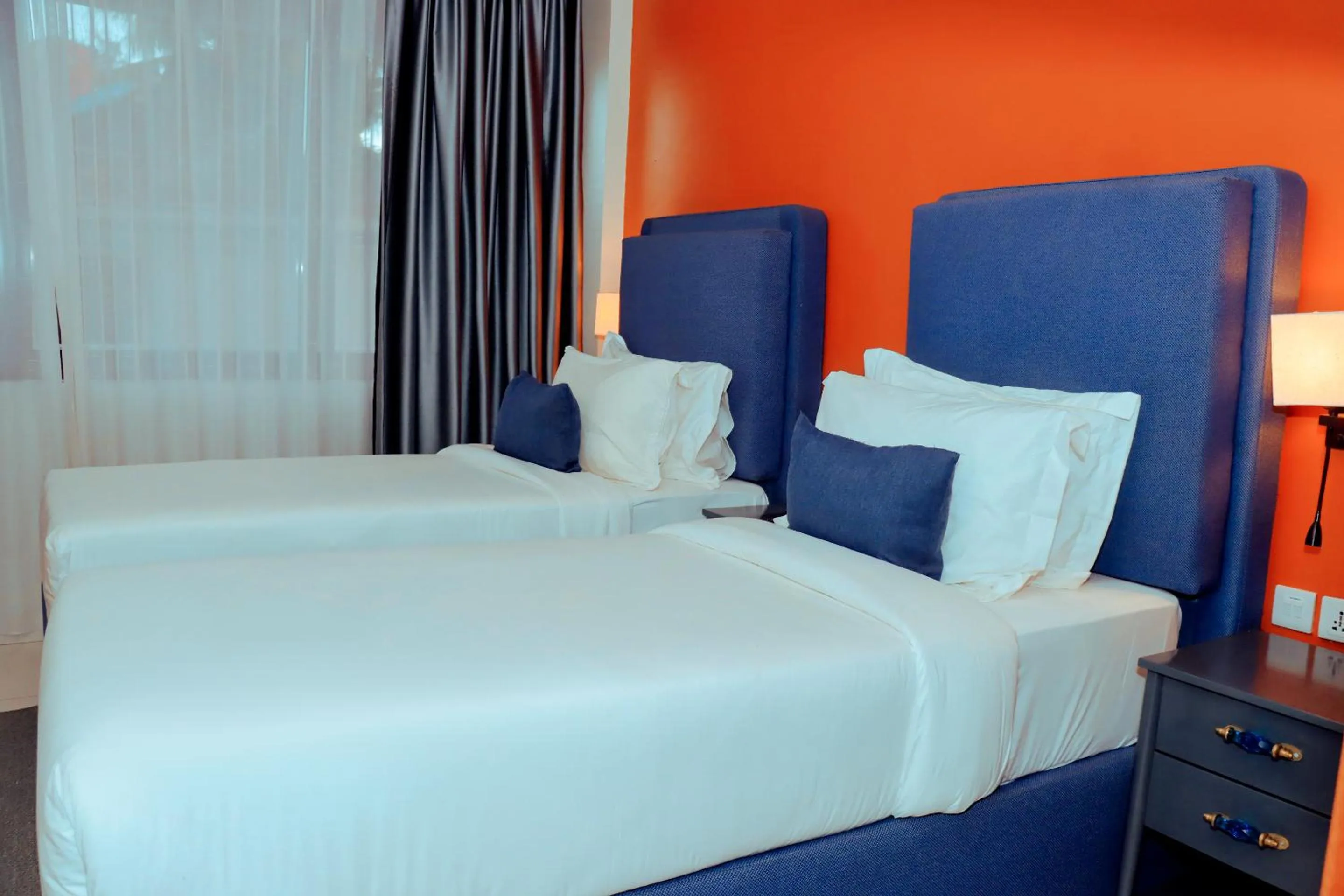 Bed in Best Western Jangwani Sea Breeze Resort
