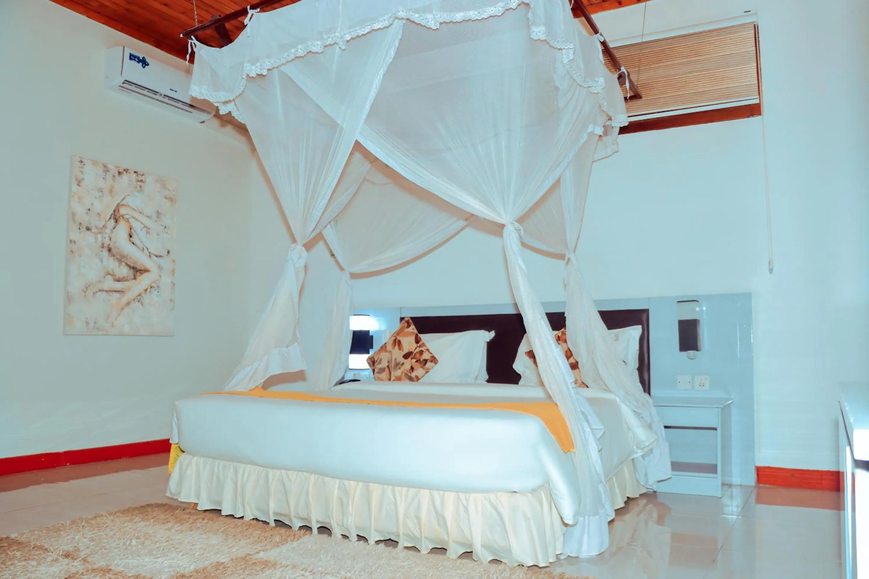 Bed in Best Western Jangwani Sea Breeze Resort