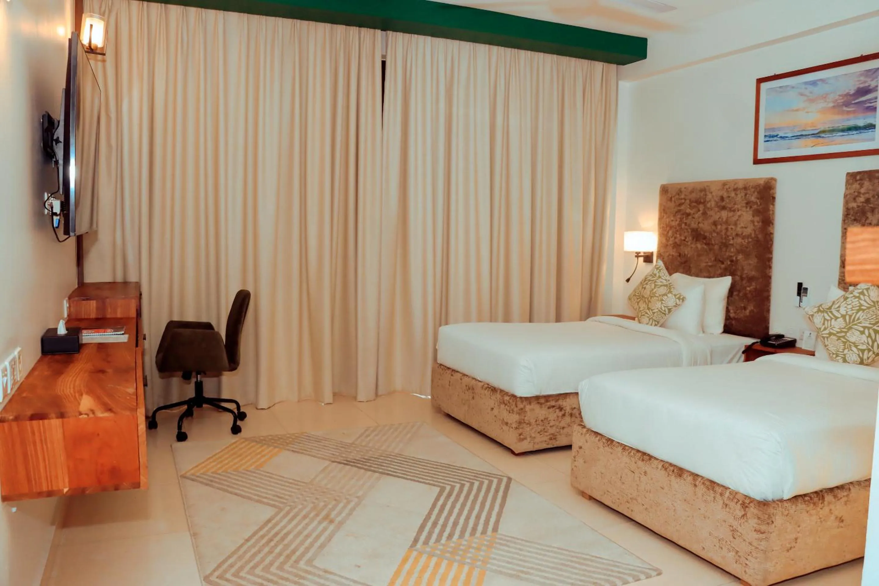 Bed in Best Western Jangwani Sea Breeze Resort