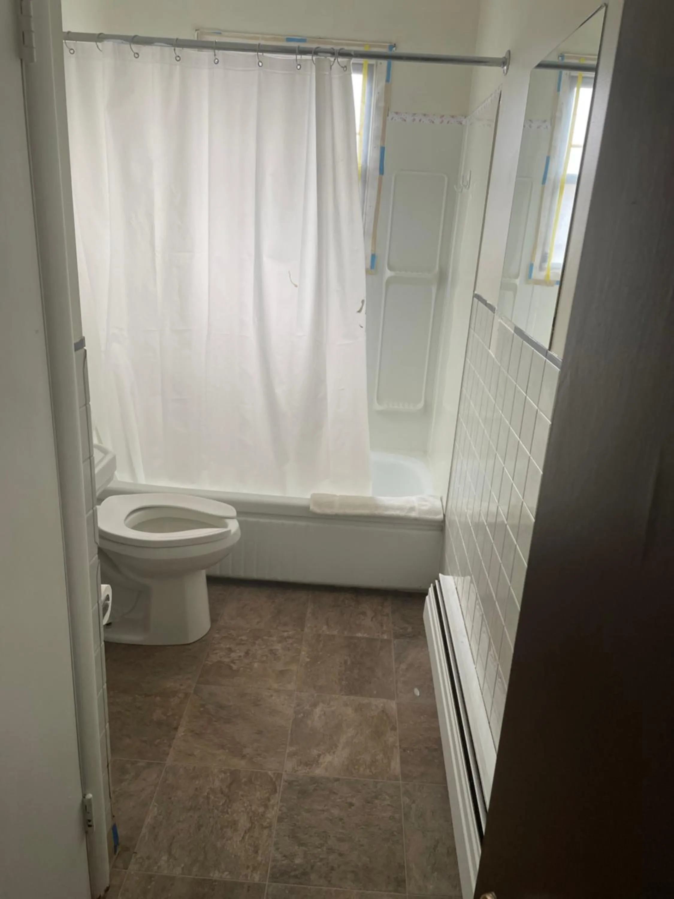 Toilet in Uptown Motel