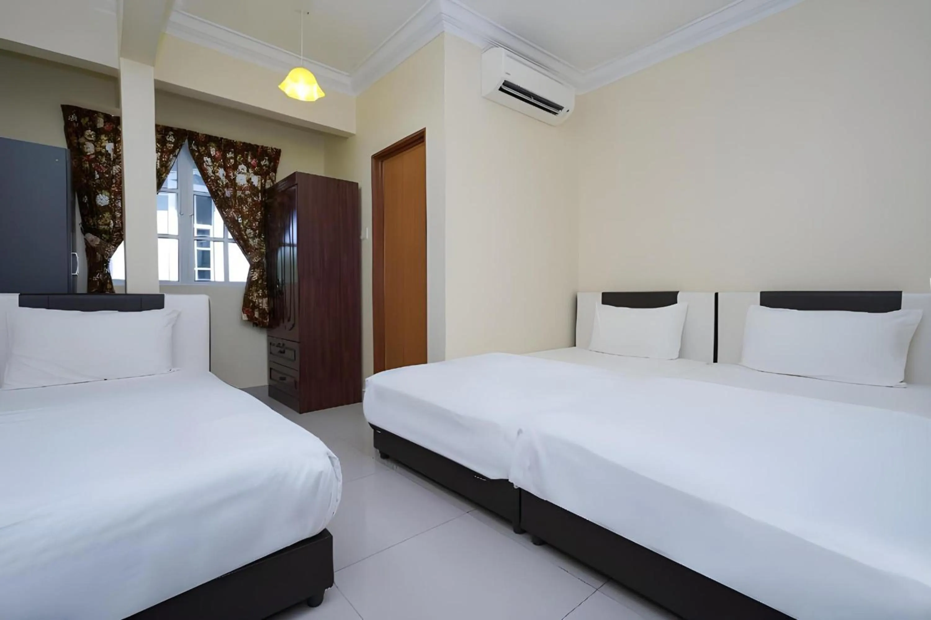 Photo of the whole room, Bed in Hotel O Bangi Sri Minang Guesthouse
