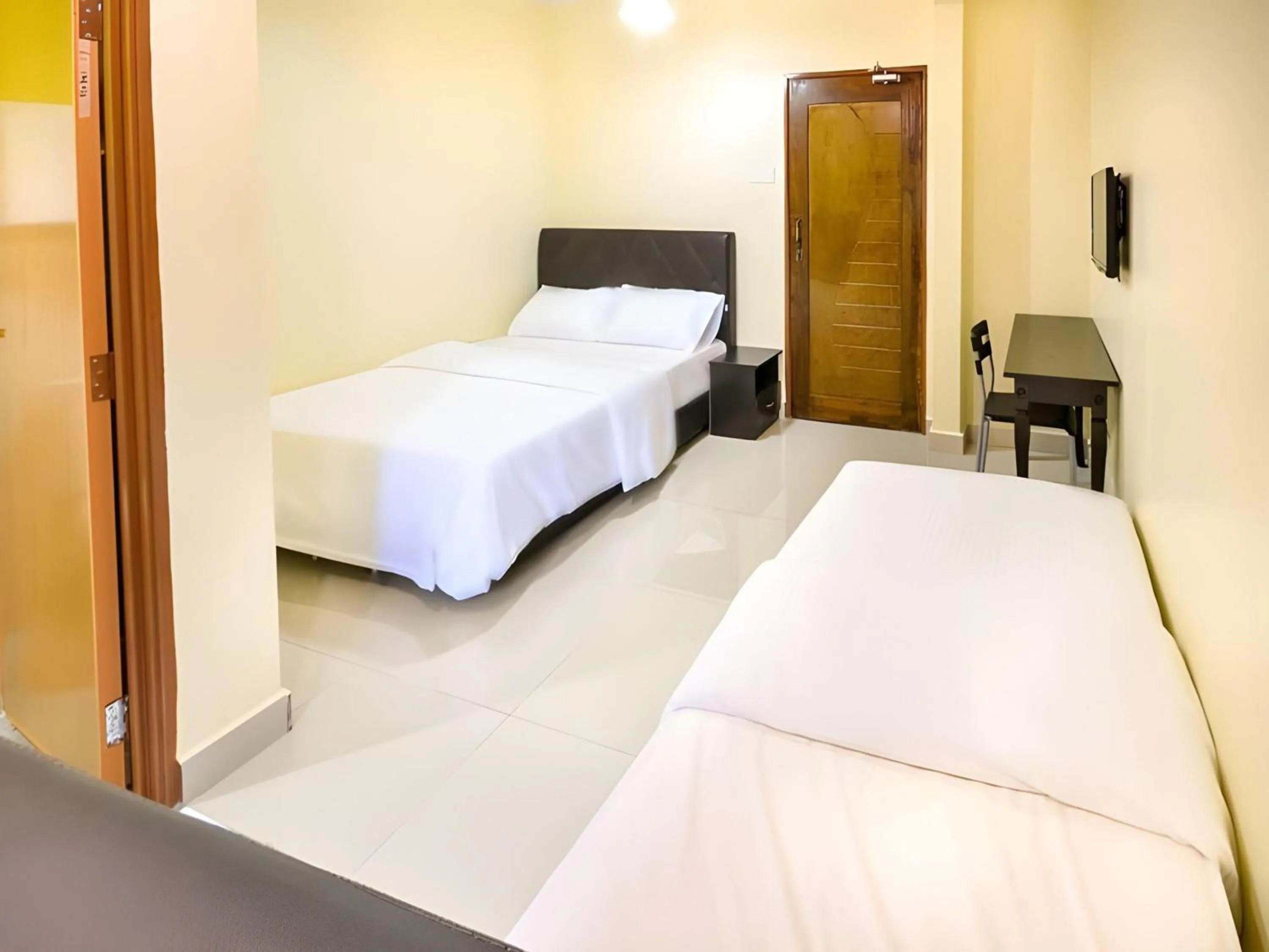 Photo of the whole room, Bed in Hotel O Bangi Sri Minang Guesthouse