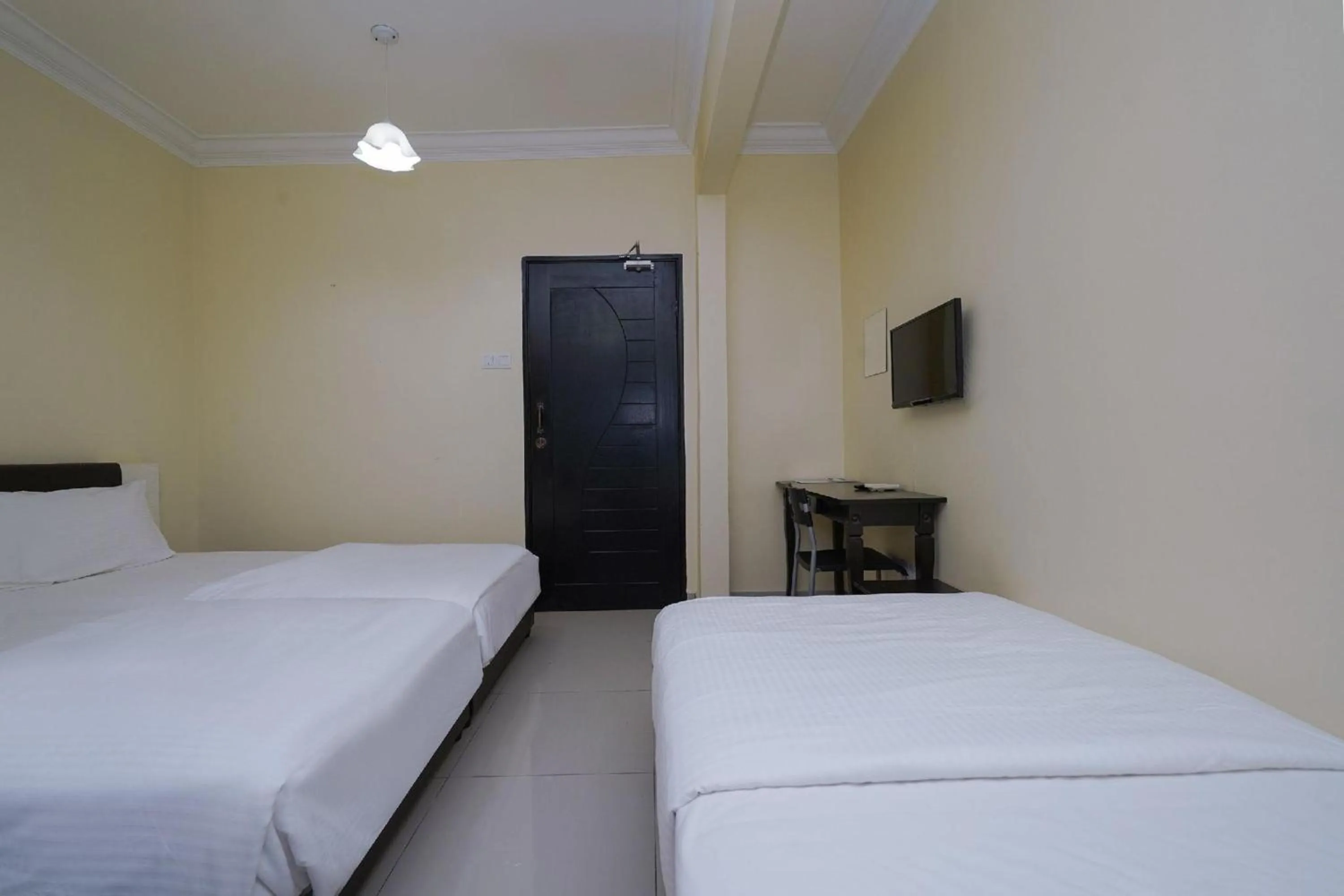Photo of the whole room, Bed in Hotel O Bangi Sri Minang Guesthouse