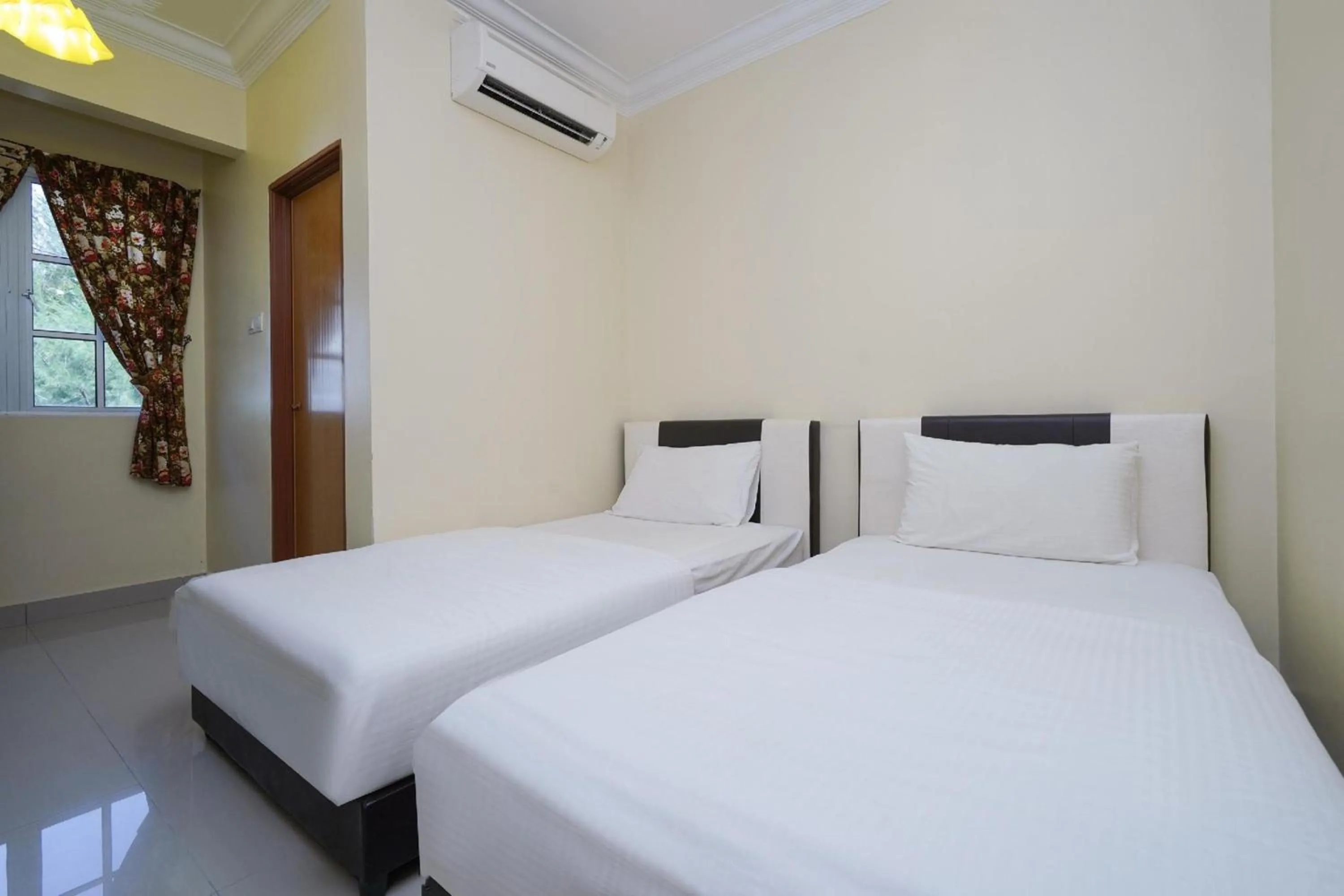 Photo of the whole room, Bed in Hotel O Bangi Sri Minang Guesthouse