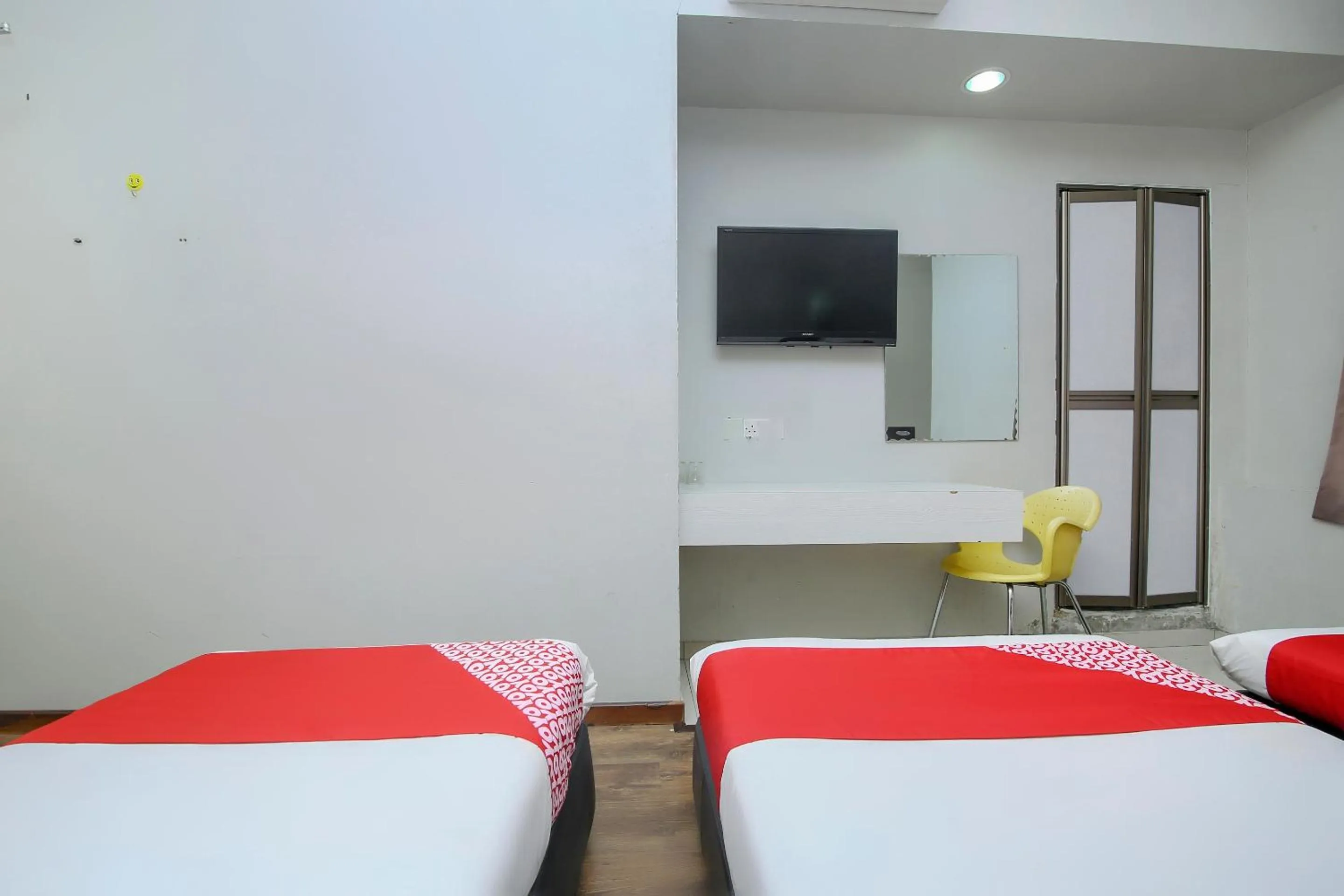 Bedroom, Bed in Hotel O Nice Stay Three Six Five Services