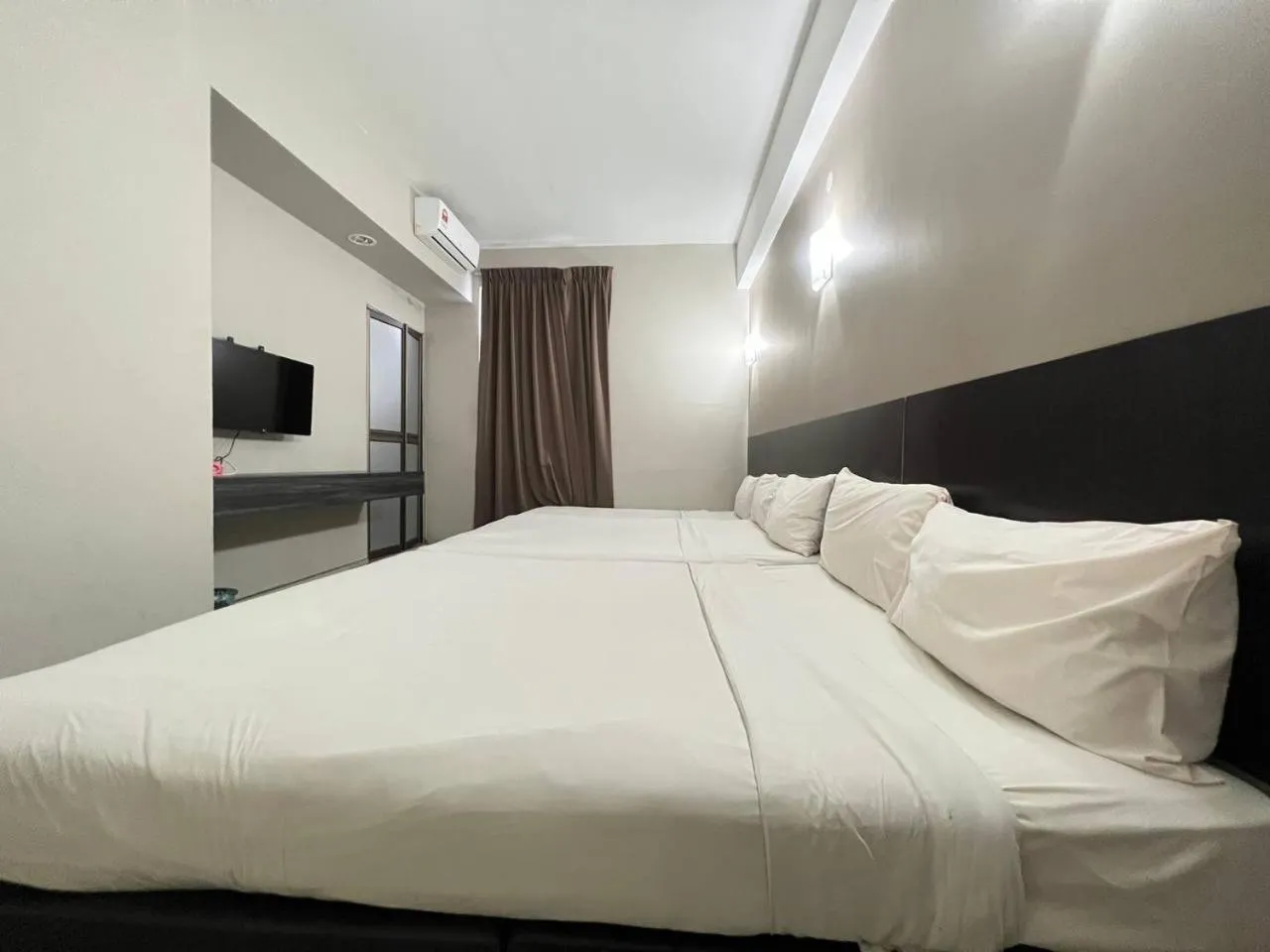 Bedroom, Bed in Hotel O Nice Stay Three Six Five Services