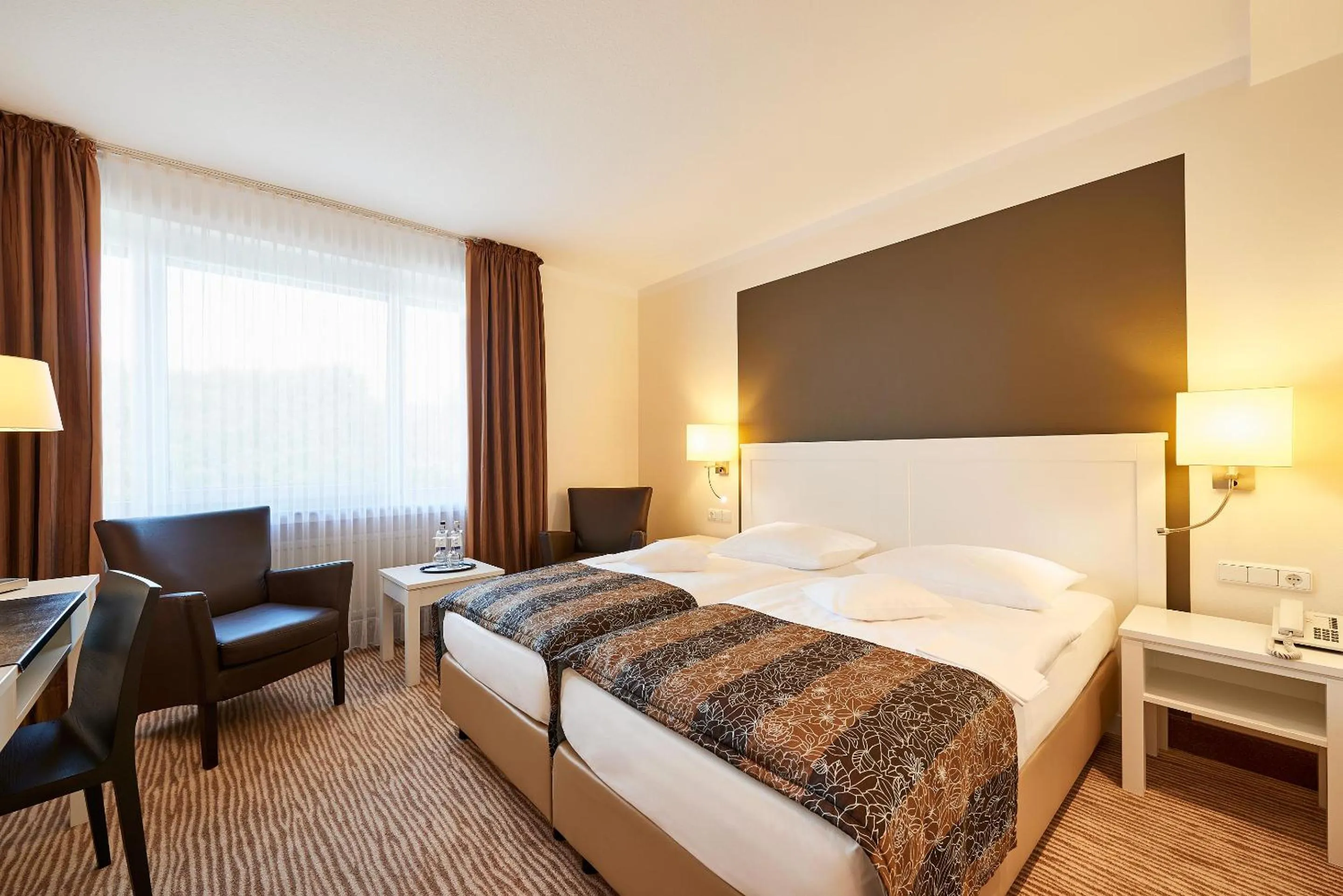 Bed in MUNTE - Wellnesshotel am Stadtwald