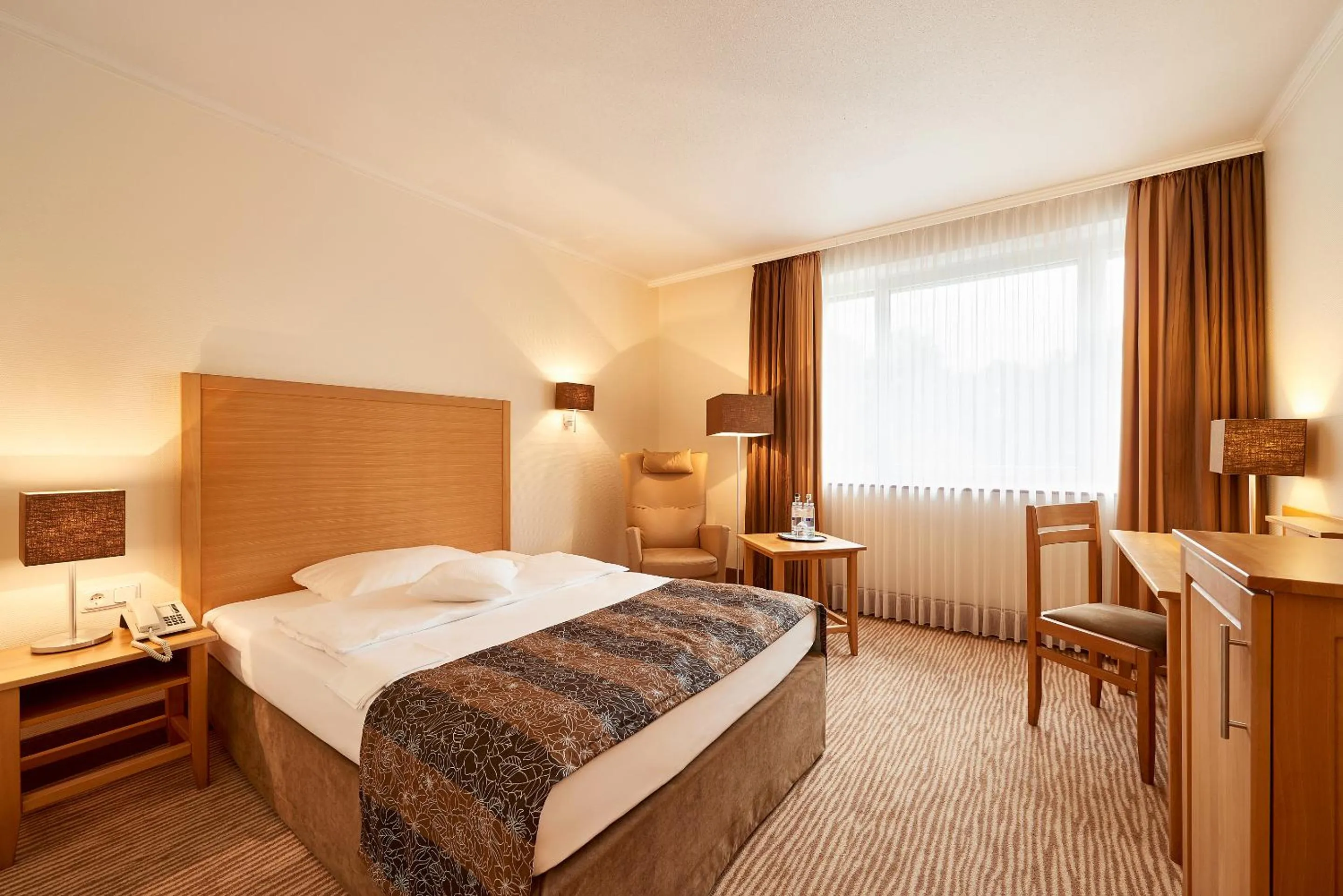 Bed in MUNTE - Wellnesshotel am Stadtwald