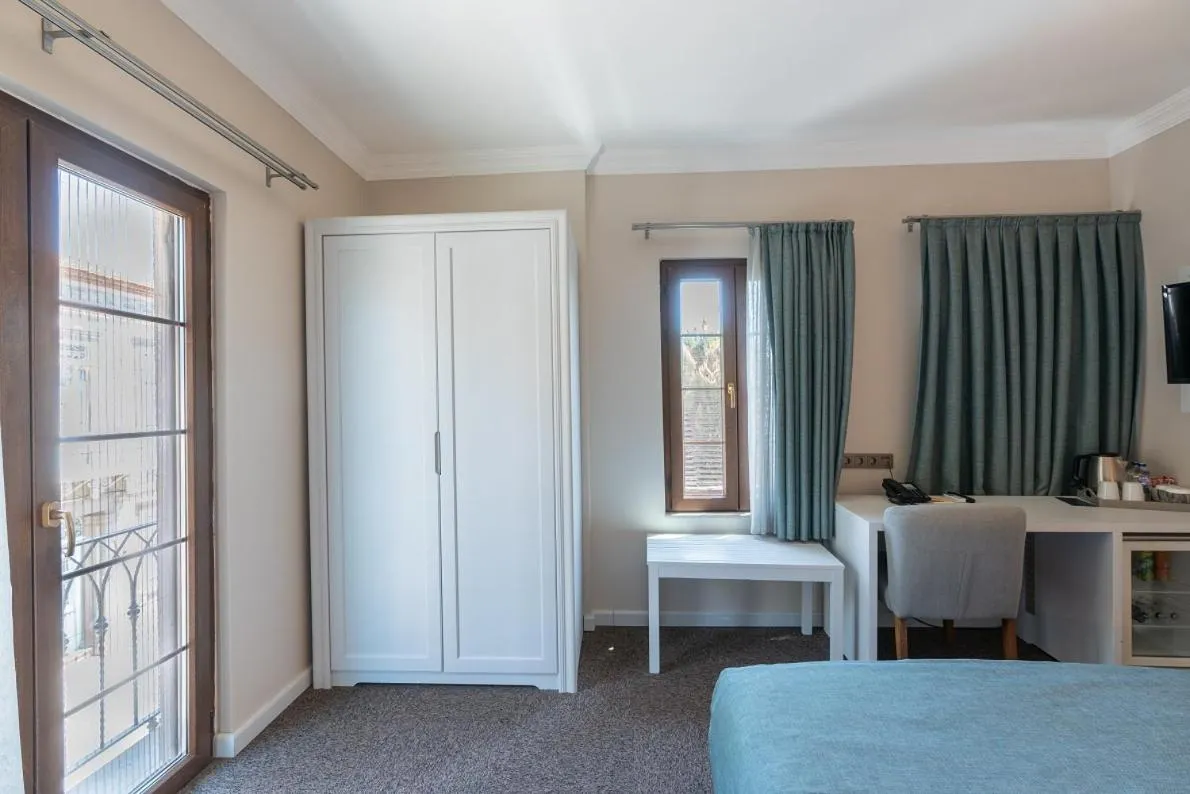 Bed in Elia Hotel Cunda by Ortunc