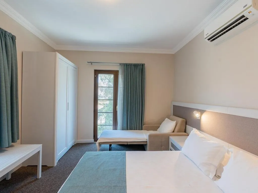 Bed in Elia Hotel Cunda by Ortunc