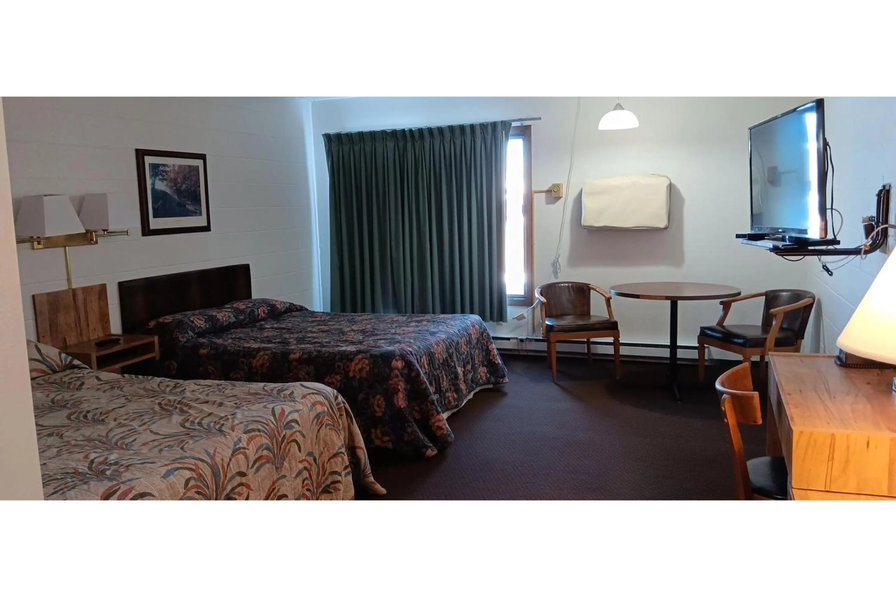 Bedroom in Scotwood Motel by OYO Washburn ND