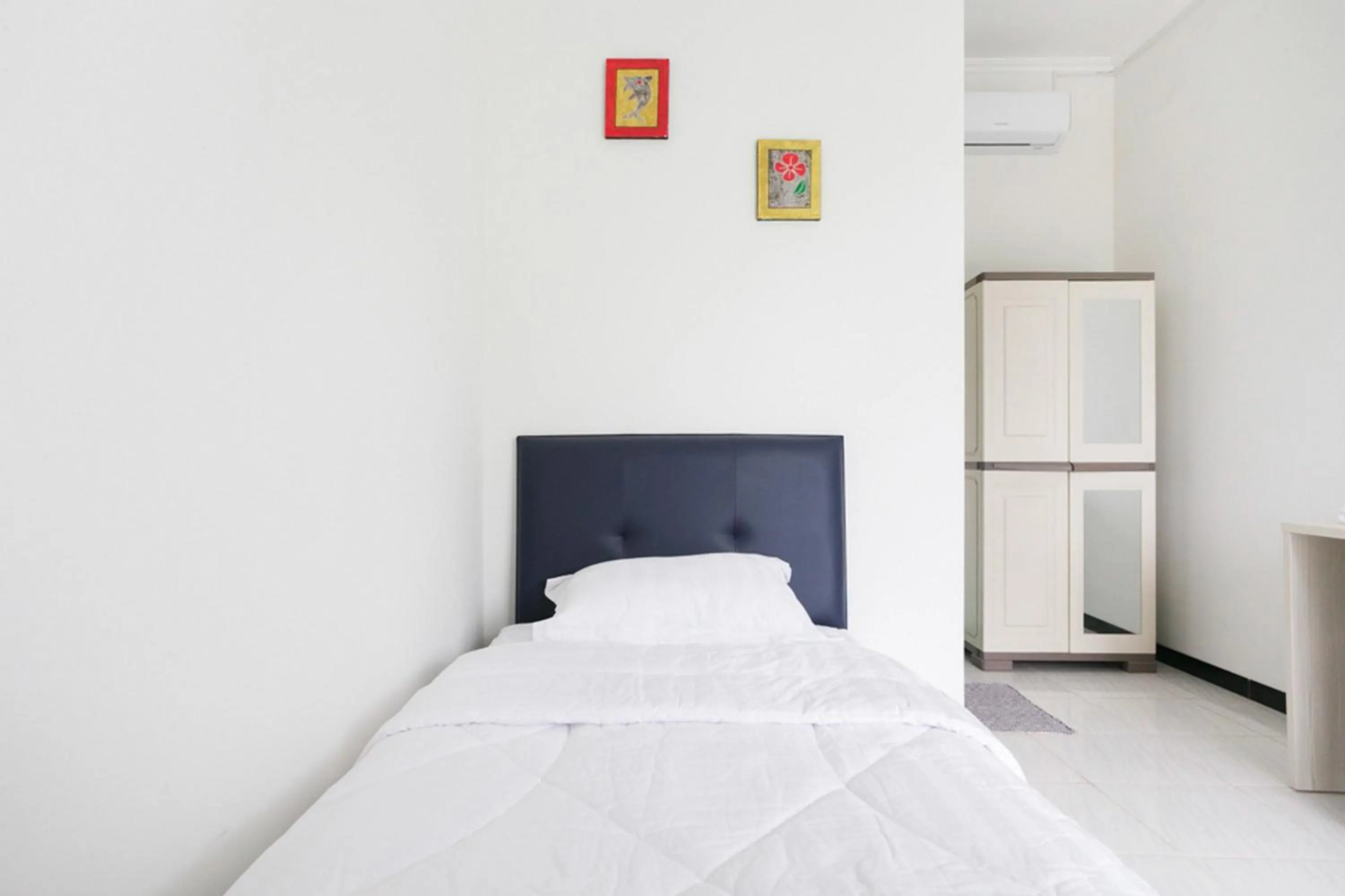 Bed in RedDoorz Syariah near Stadion Teladan Medan