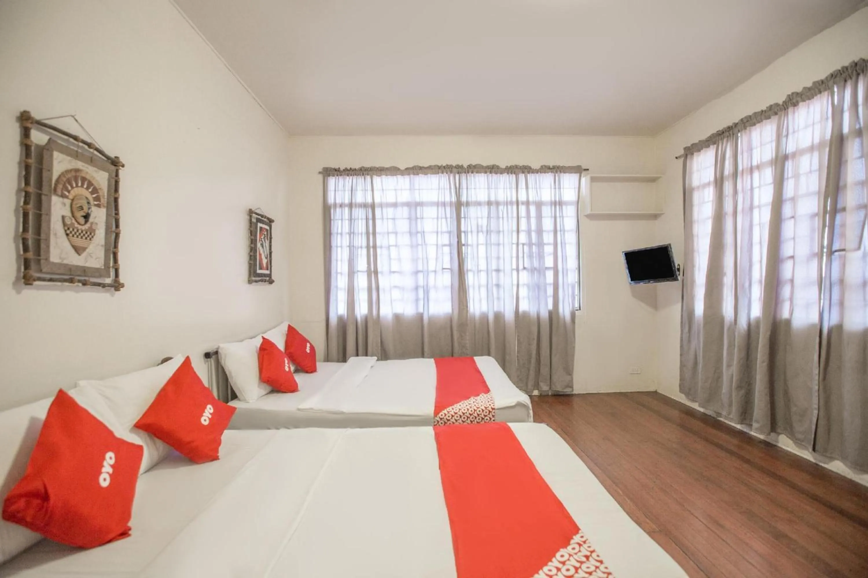 Bedroom, Bed in OYO 588 Sunrock Resort