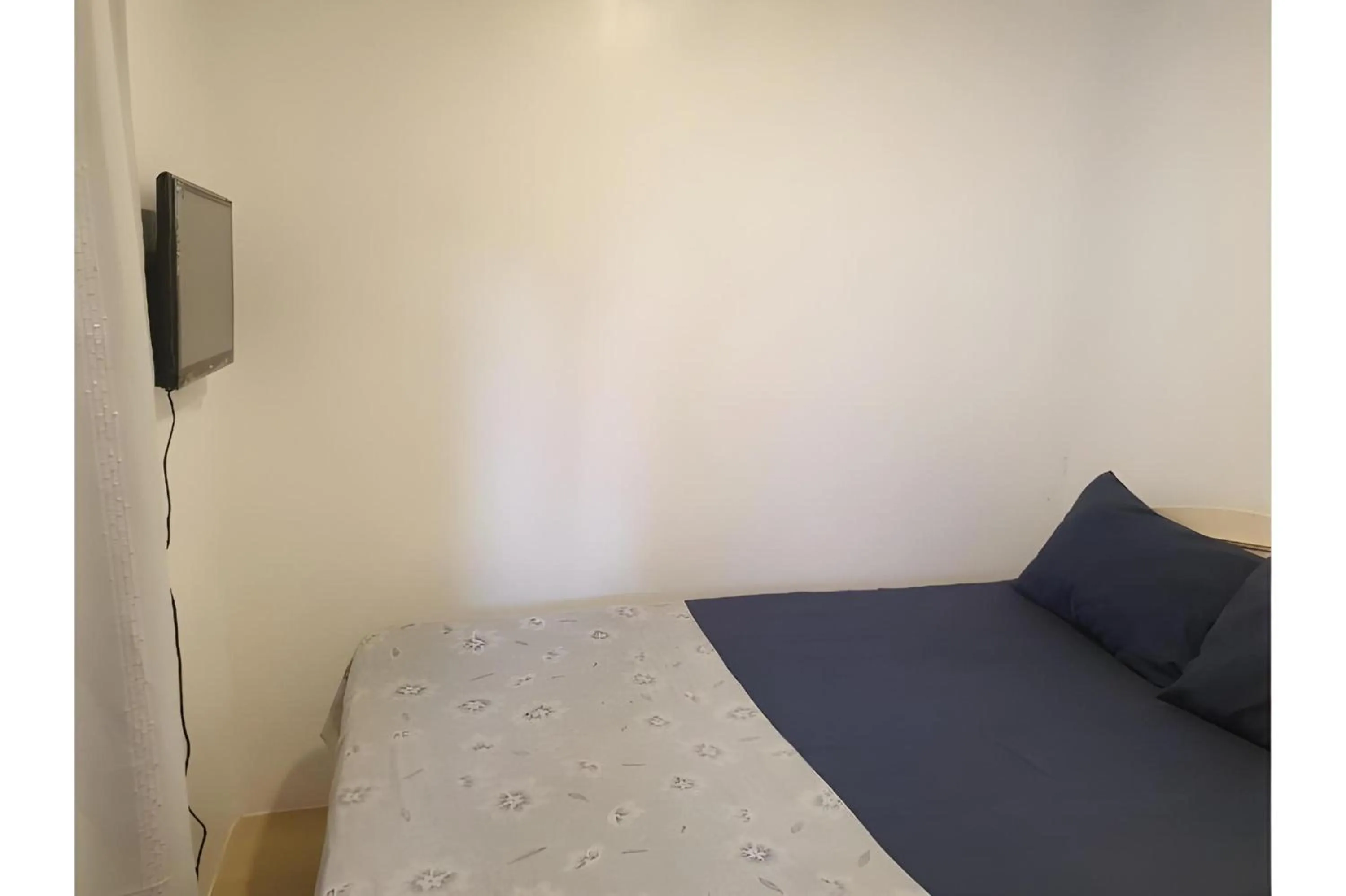 Photo of the whole room, Bed in OYO 588 Sunrock Resort