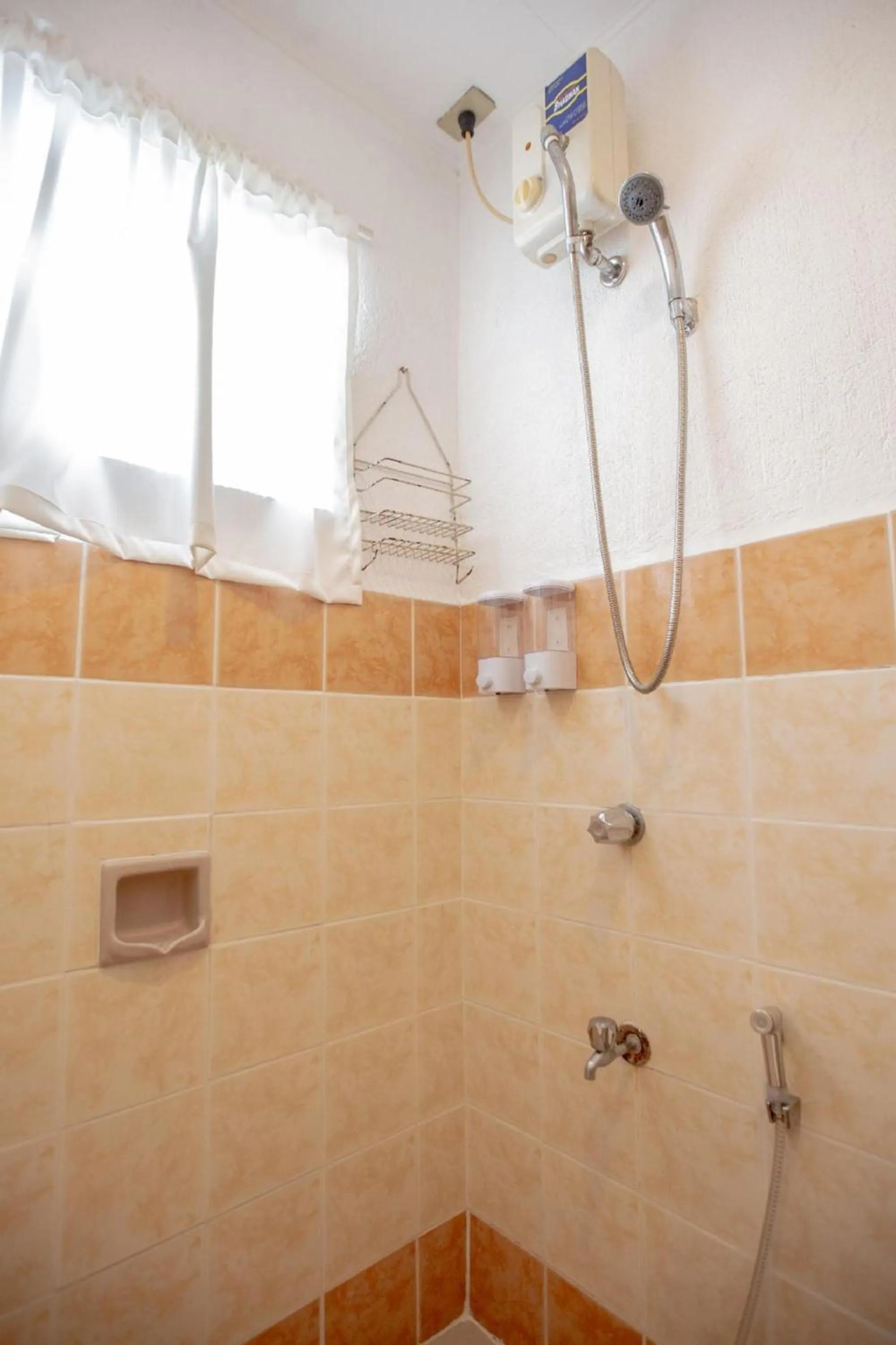 Bathroom in OYO 588 Sunrock Resort