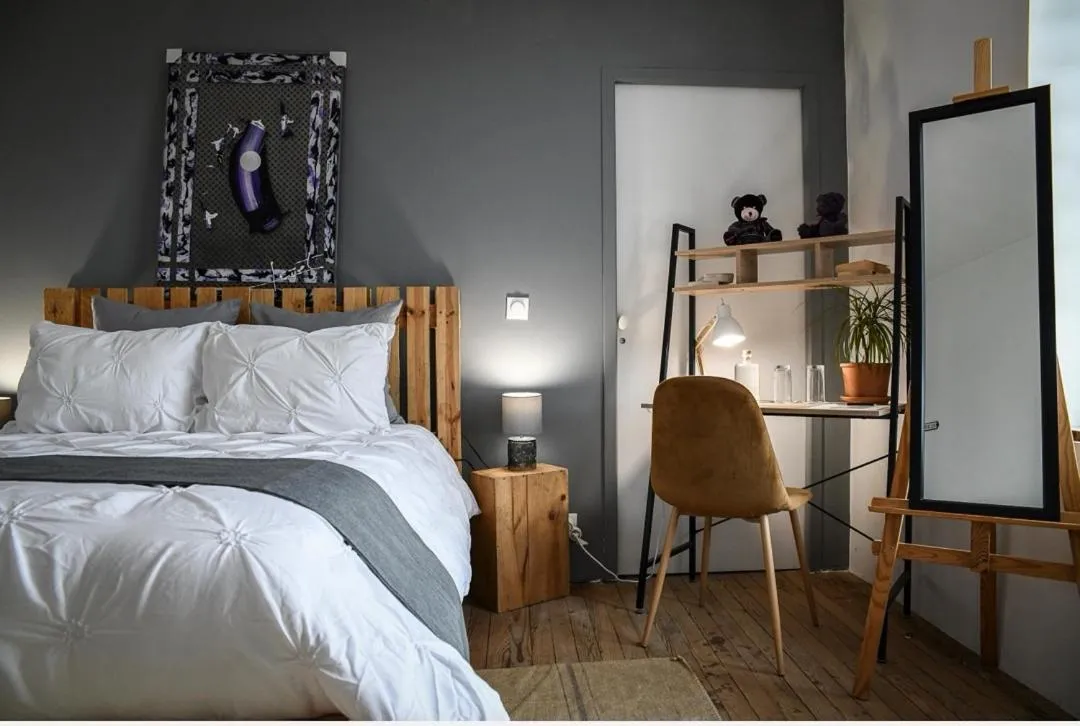 Bed in La Maison Fleur de Frangipanier