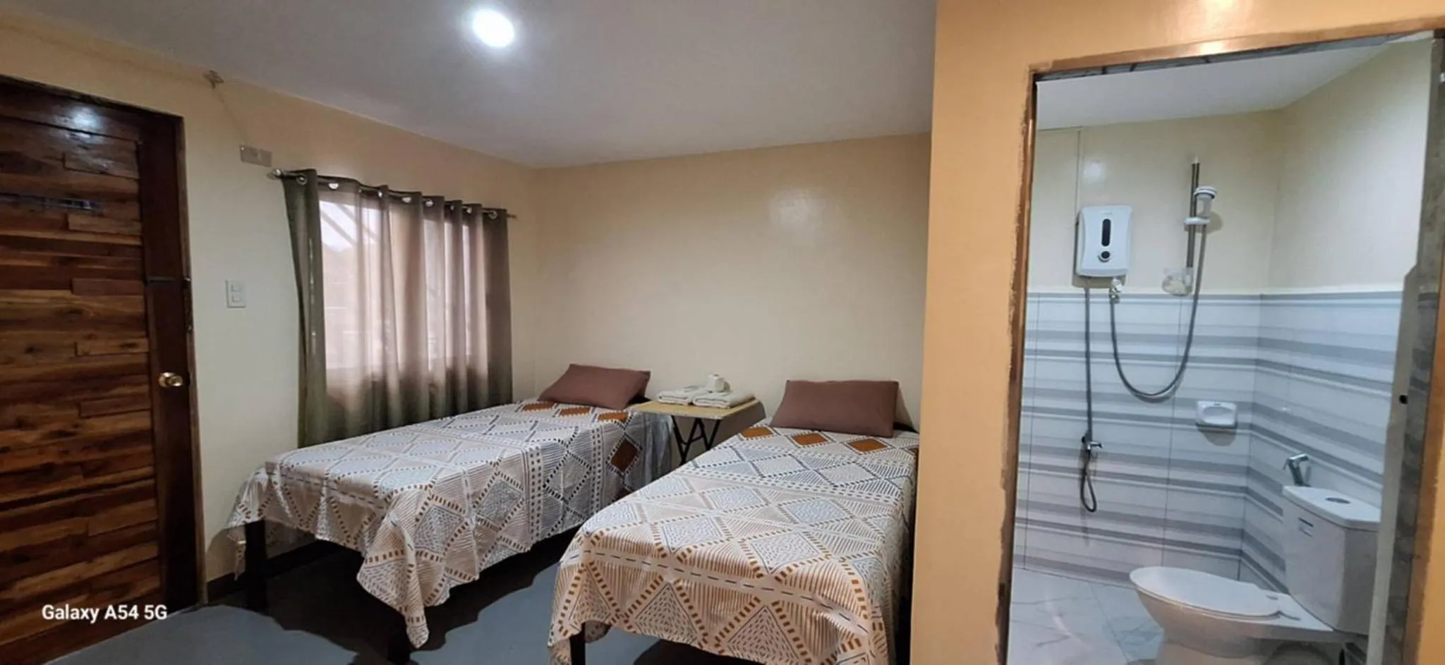 Bed in Rain Haven Lodging House