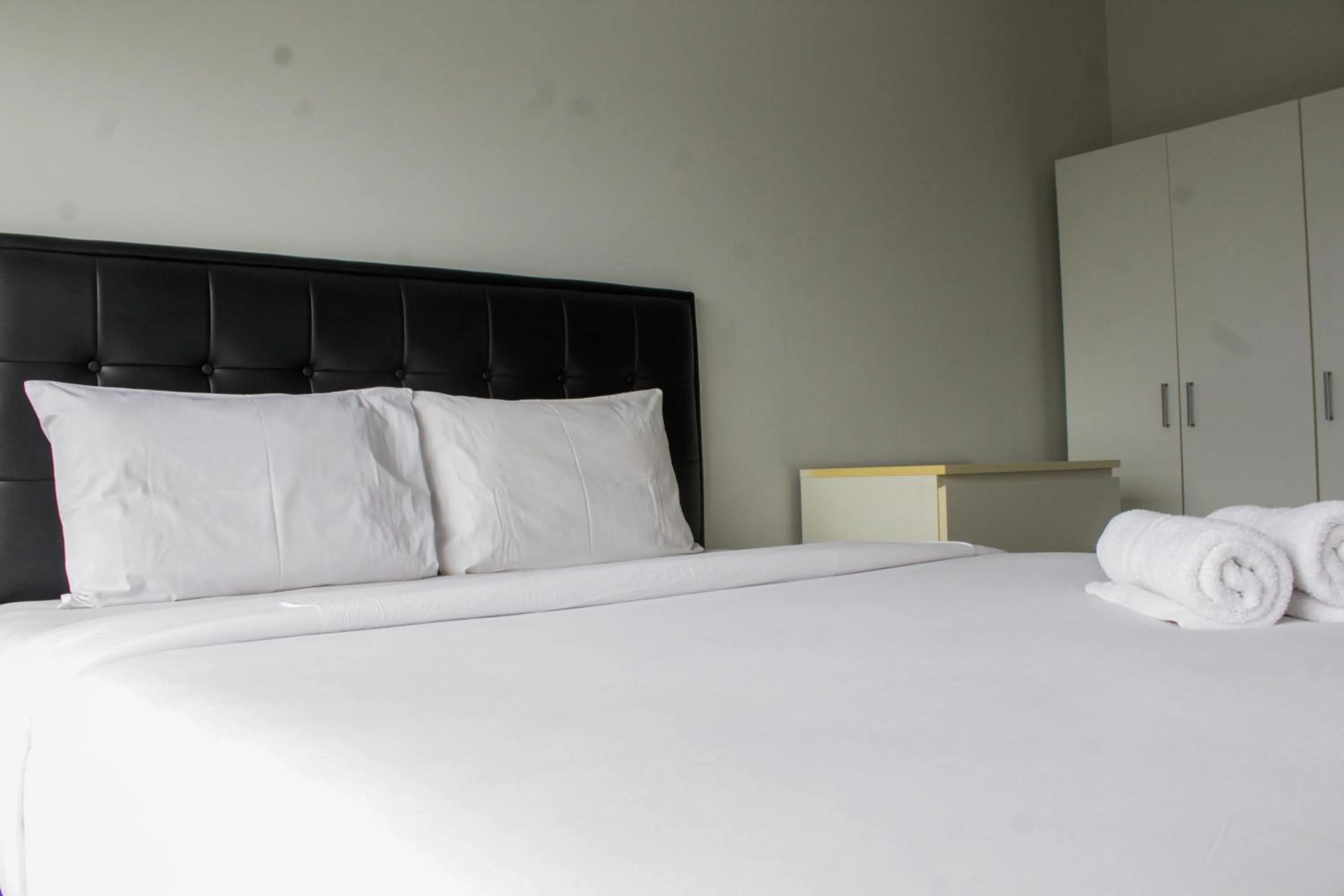 Minimalist and Comfy 1BR Apartment Scientia Residence By Travelio