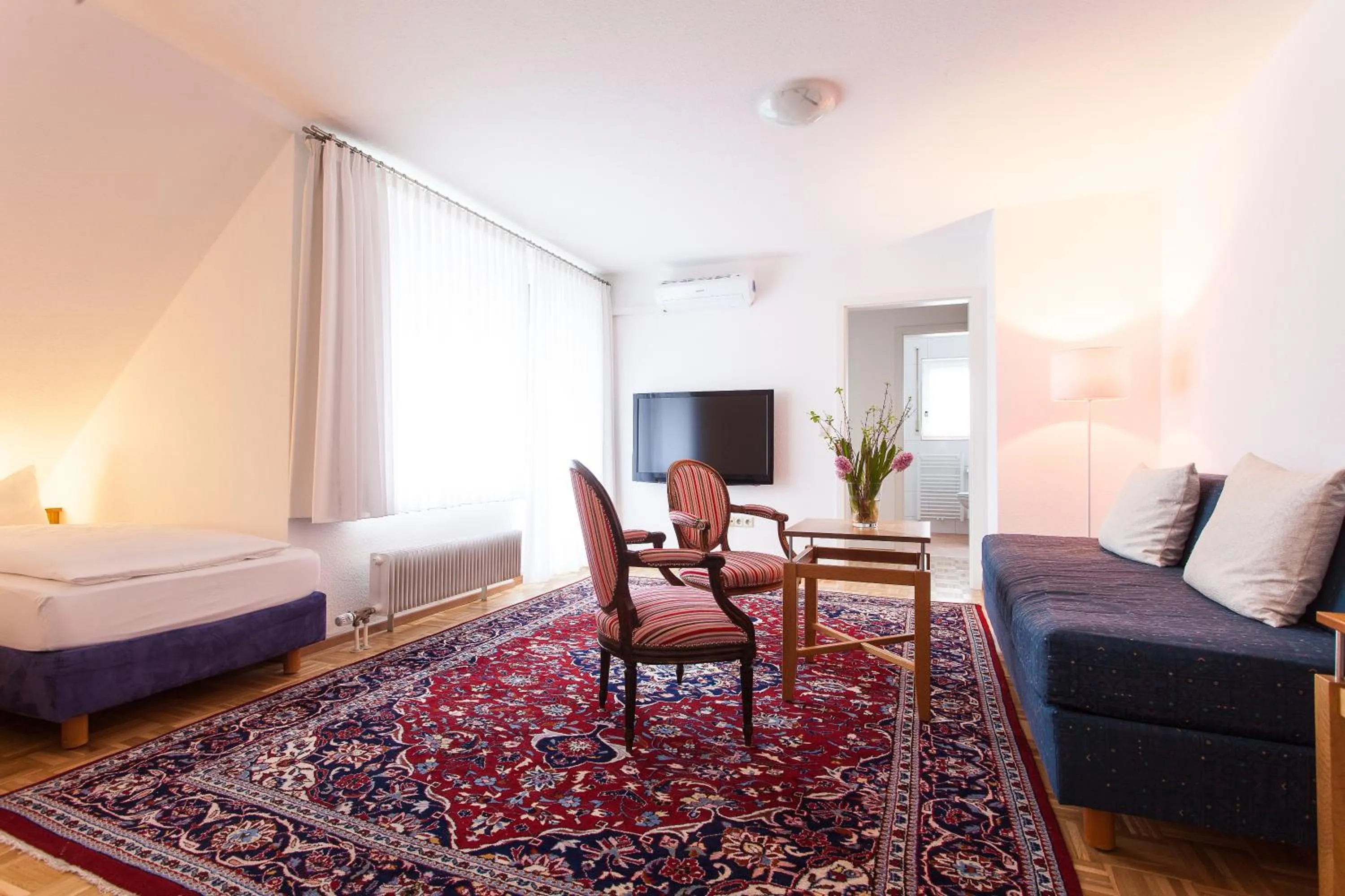 Living room, Bed in Hotel garni Schacherer