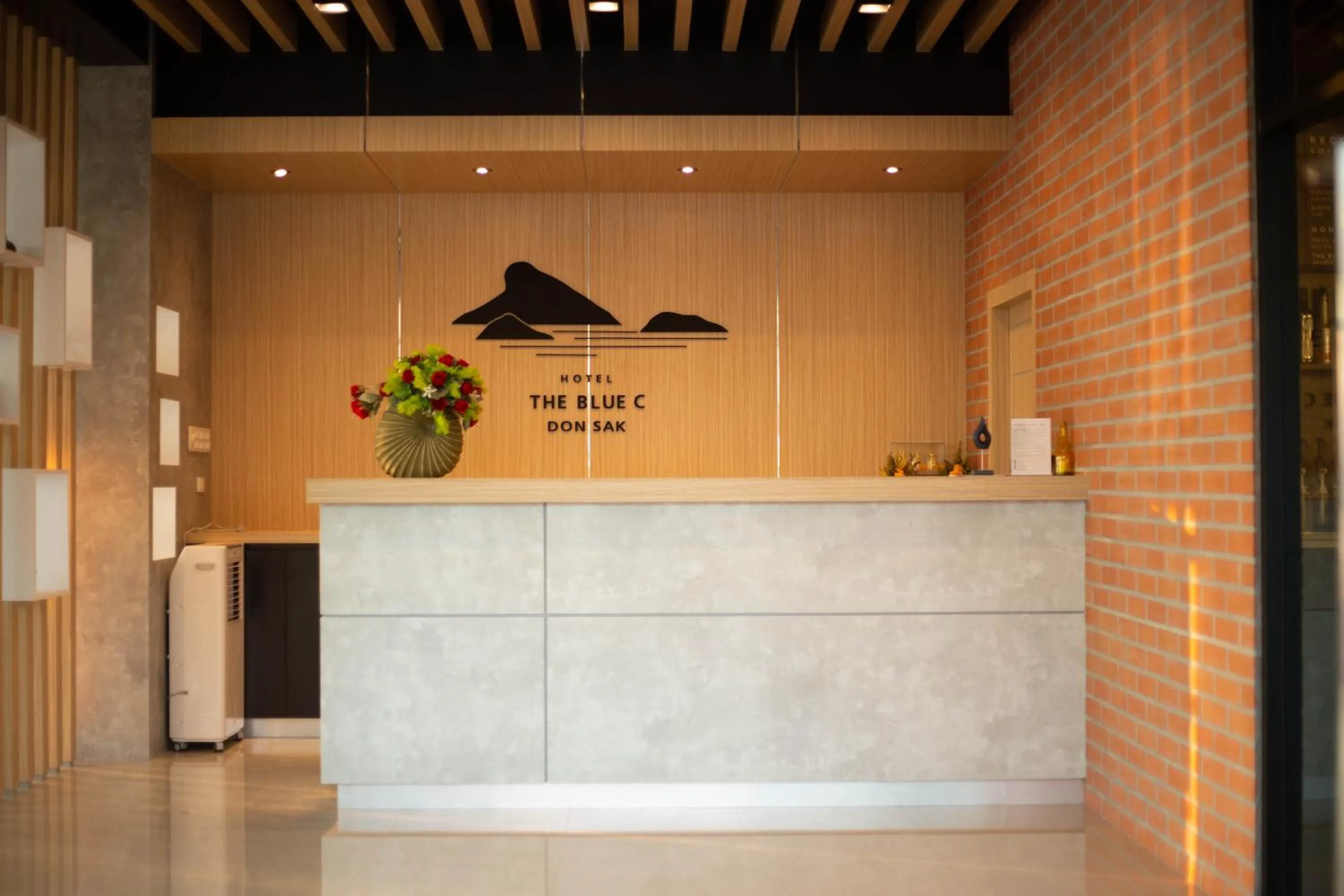 Property logo or sign in The Blue C Donsak