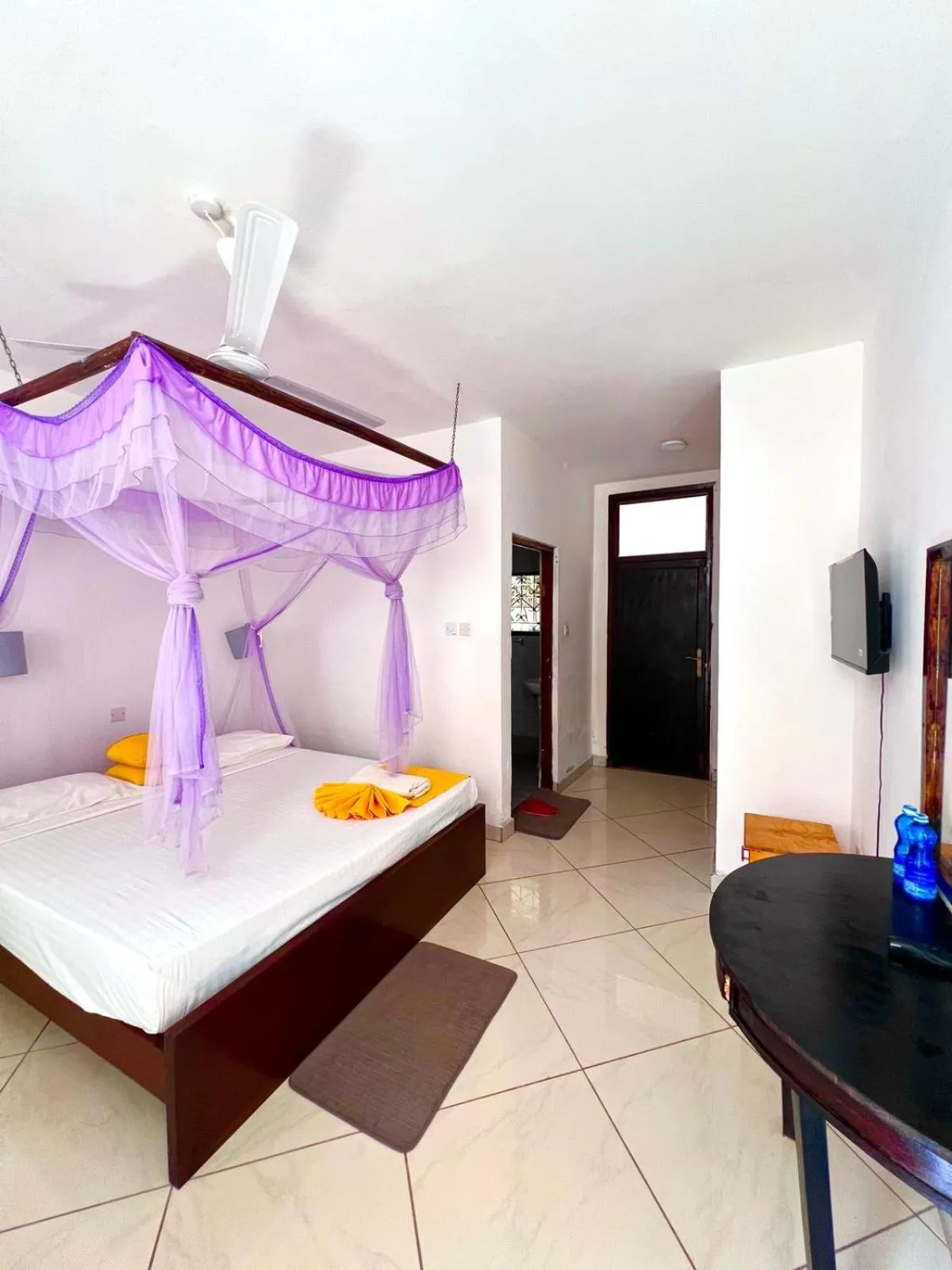 Bed in Papillon Garden Bar Villas