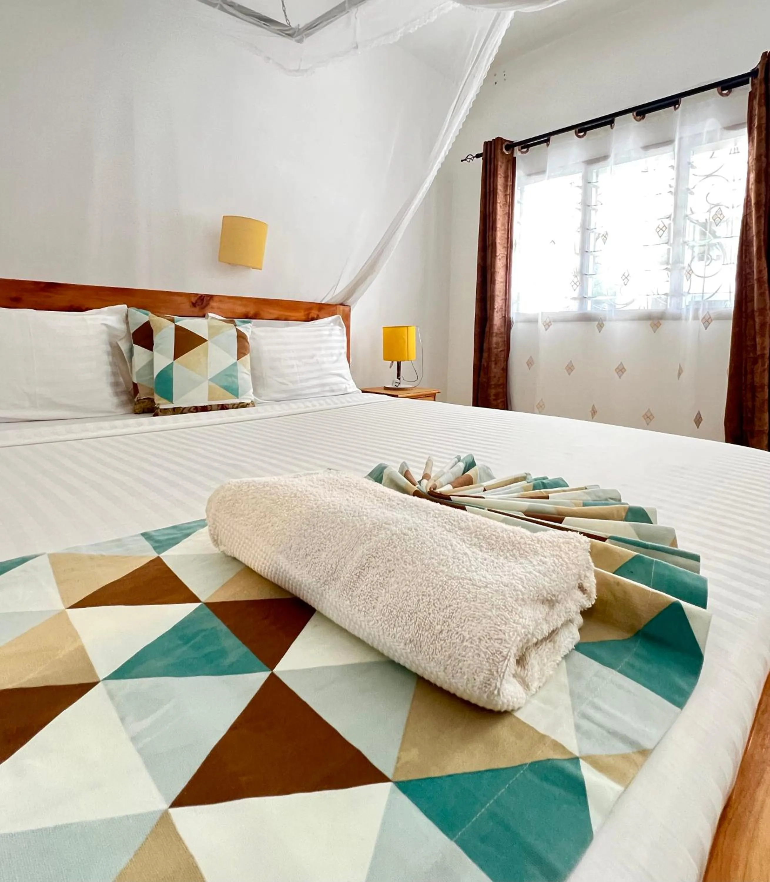 Bed in Papillon Garden Bar Villas