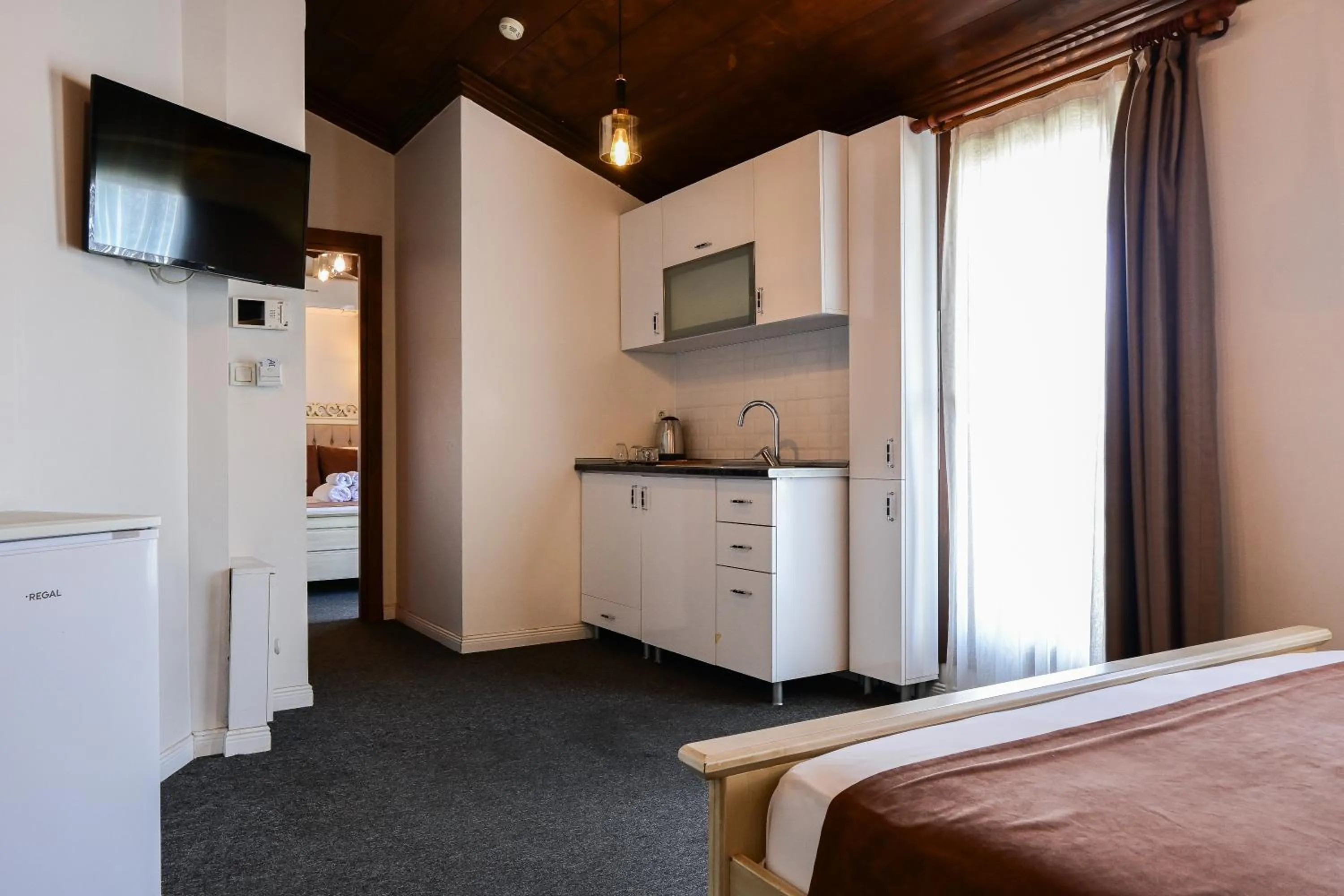 Kitchen or kitchenette, Bed in Galata Dream Hotel