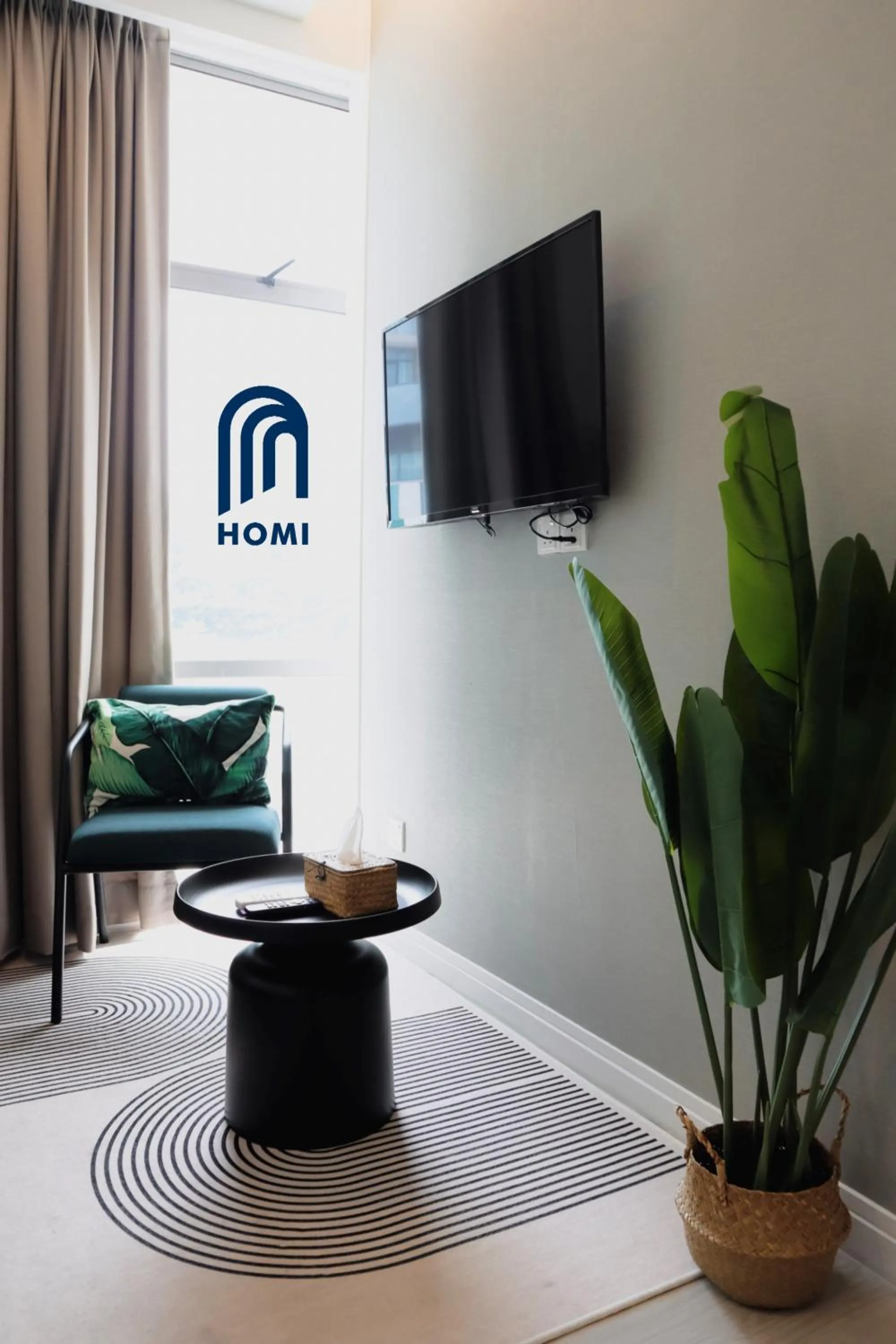 TV and multimedia in Homi Oasis at KK Times Square 和逸绿洲