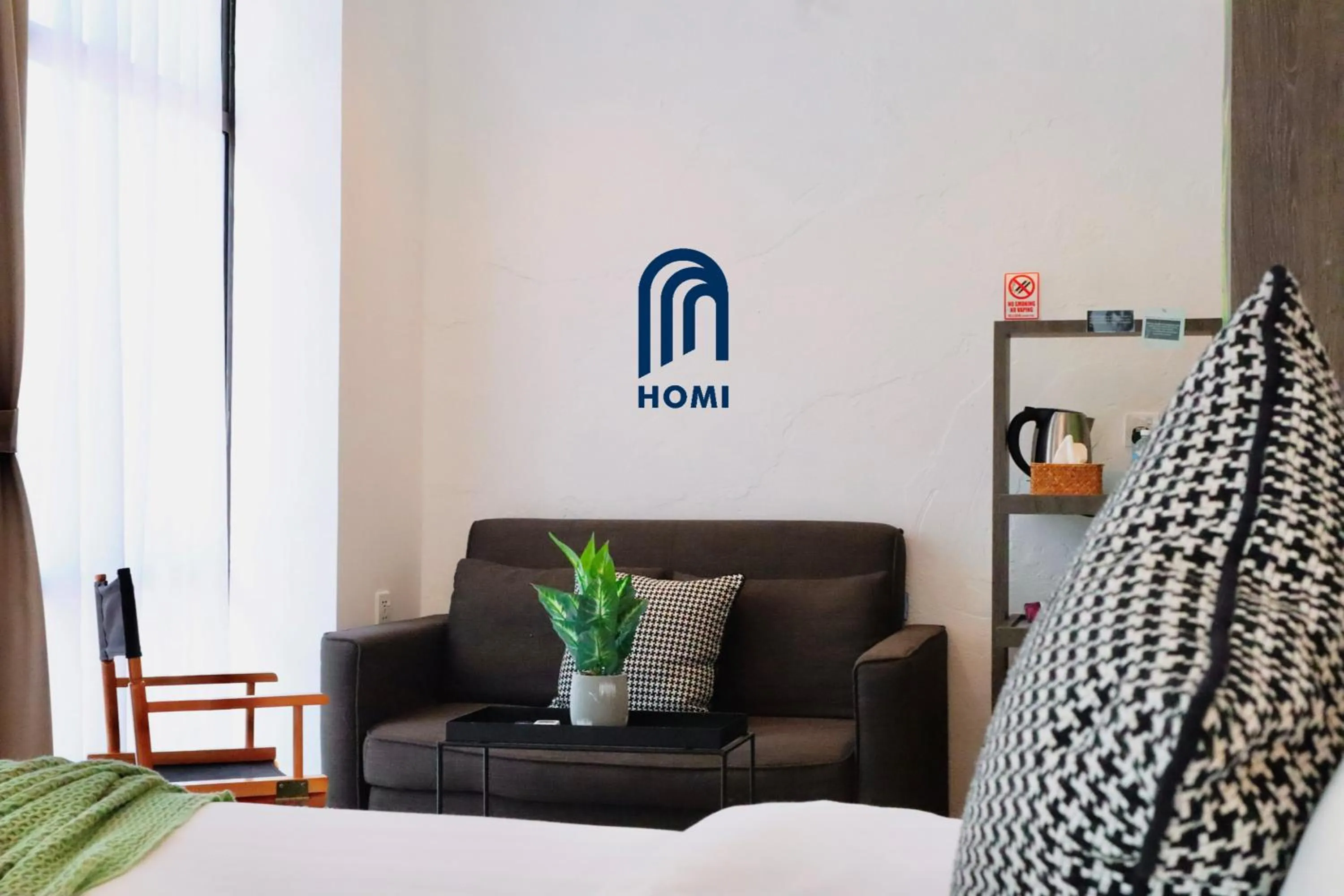 Living room in Homi Oasis at KK Times Square 和逸绿洲