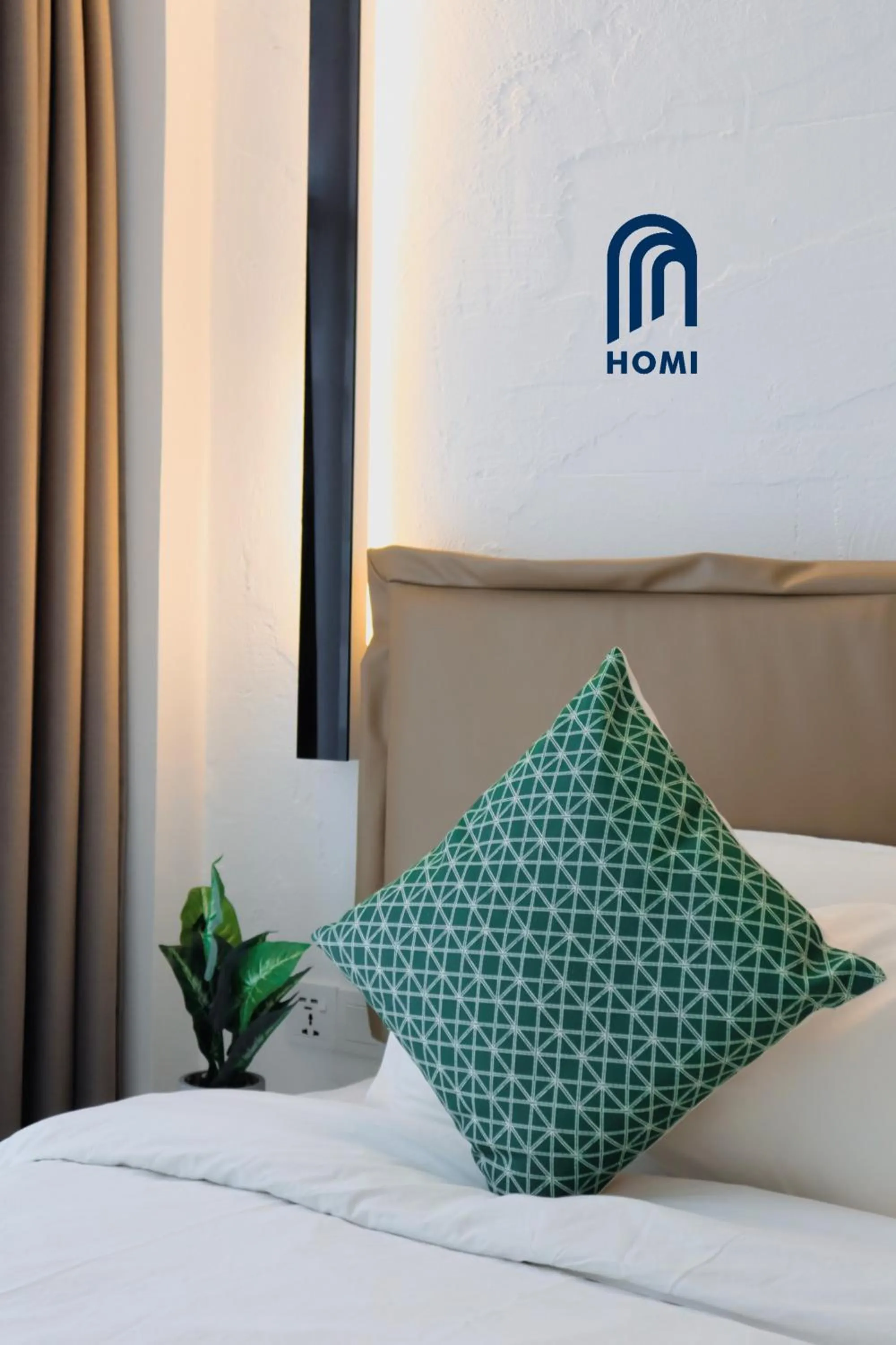 Photo of the whole room, Bed in Homi Oasis at KK Times Square 和逸绿洲